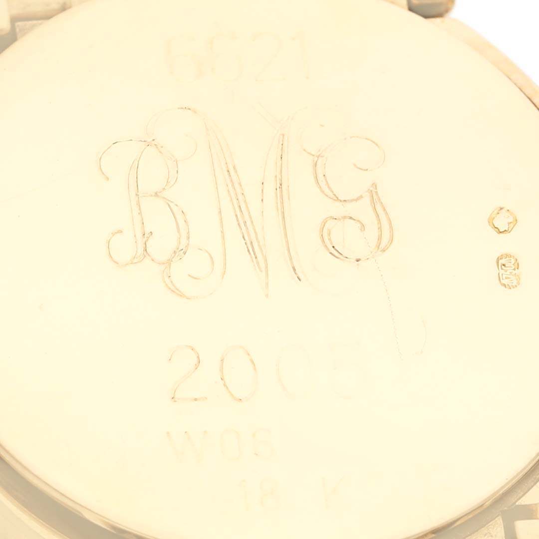 The image shows the engraved back case of a Rolex Cellini 6621 Women's Yellow Gold White Dial 6621 Women's Yellow Gold White Dial watch in gold.