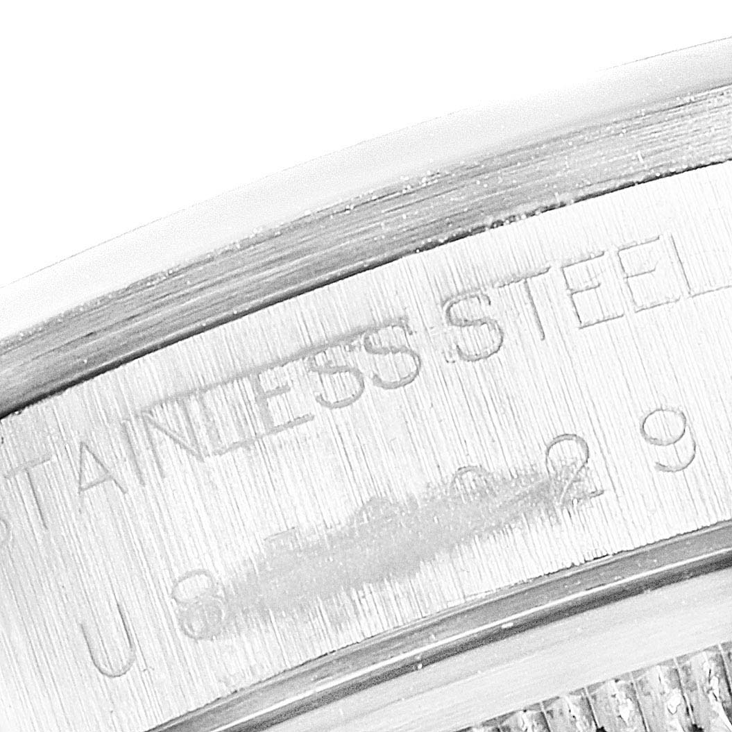 This close-up image shows the stainless steel case back edge of a Rolex Date 15200 Men's Stainless Steel Black Dial 15200 Men's Stainless Steel Black Dial model watch.