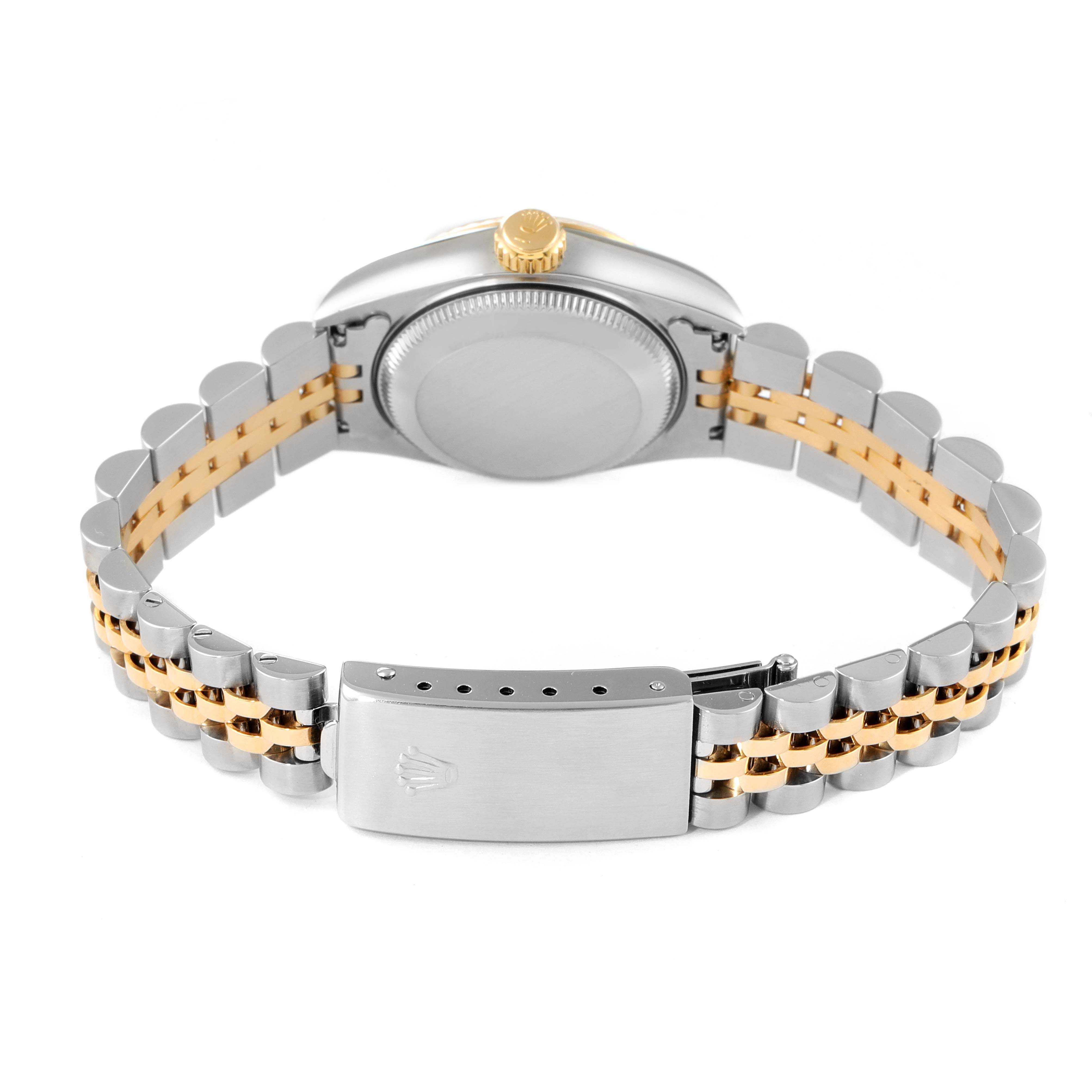 This image shows the rear side of a Rolex Datejust 69173 Women
s Steel and Gold (two tone) Champagne Dial 69173 Women
s Steel and Gold (two tone) Champagne Dial watch, highlighting the case back and Jubilee bracelet with a clasp.