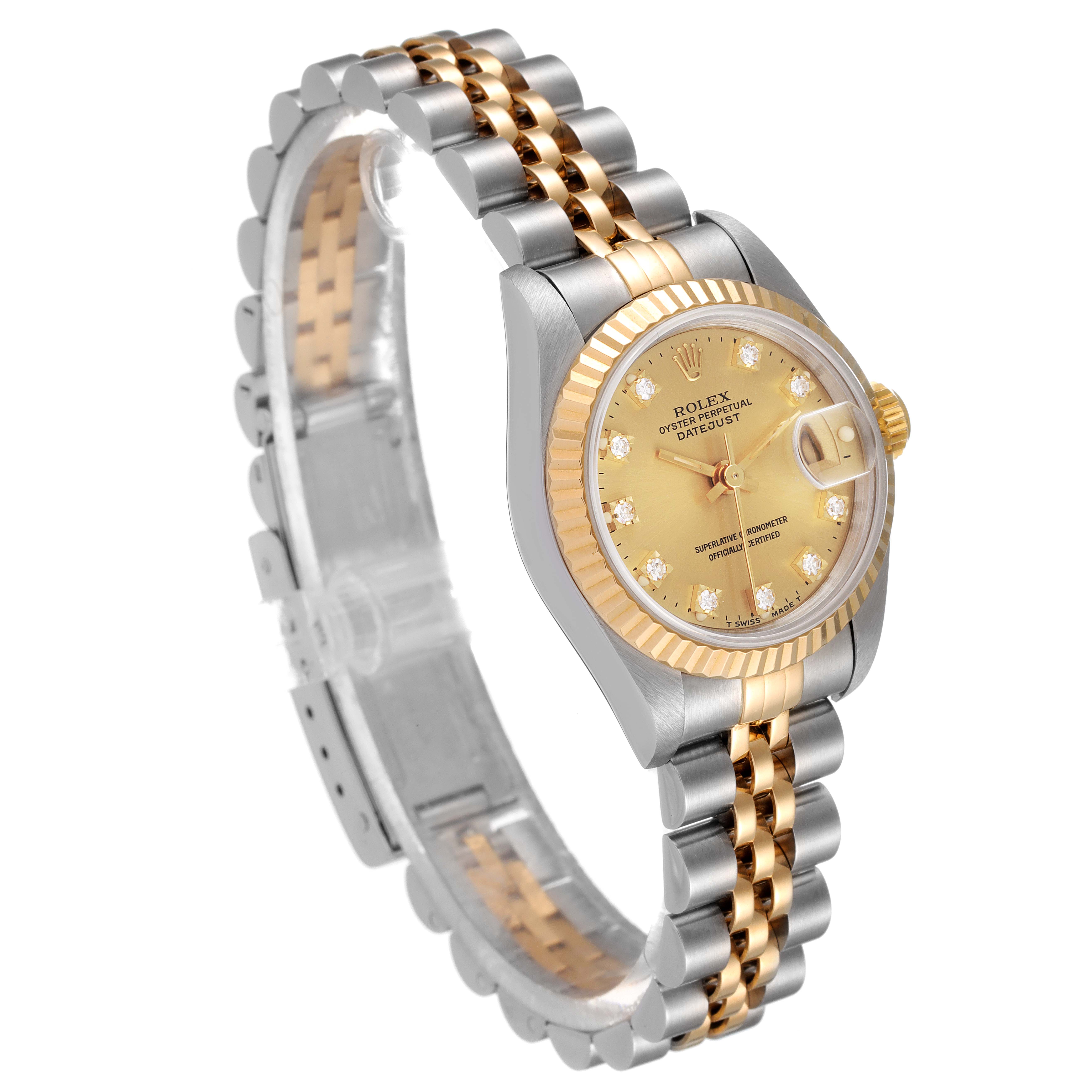 This image shows a Rolex Datejust 69173 Women
s Steel and Gold (two tone) Champagne Dial 69173 Women
s Steel and Gold (two tone) Champagne Dial watch at a slight angle, highlighting its two-tone bracelet and champagne dial with a fluted bezel.