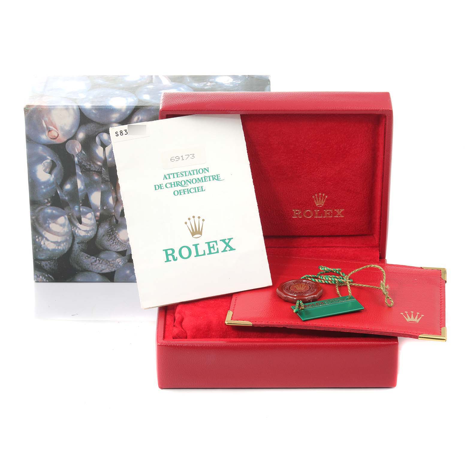 The image shows a Rolex Datejust 69173 Women
s Steel and Gold (two tone) Champagne Dial 69173 Women
s Steel and Gold (two tone) Champagne Dial set including the box, papers, and accessories from a front angle.