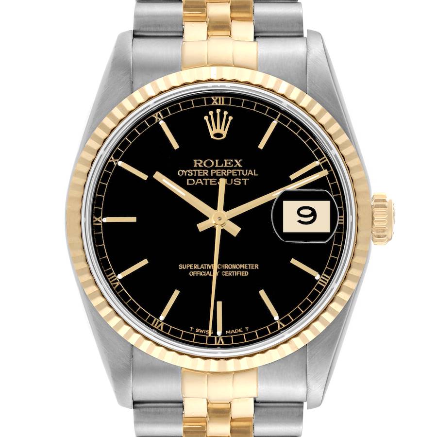 This image shows a front view of a Rolex Datejust watch, highlighting the black dial, gold fluted bezel, and two-tone bracelet.