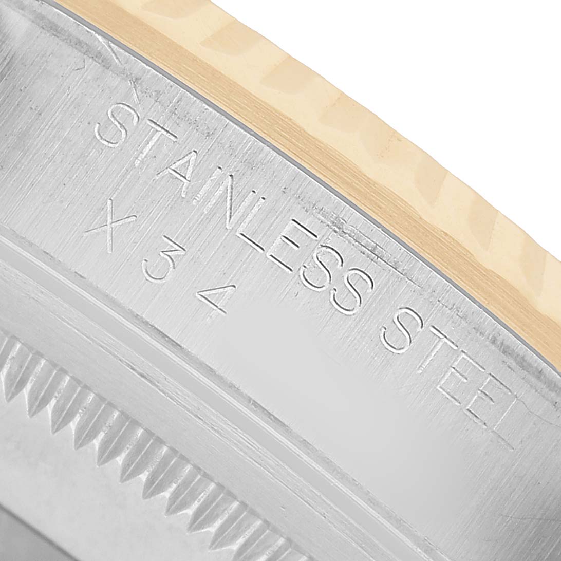 The image shows an angled close-up of the Rolex Datejust 16233 Men's Steel and Gold (two tone) Champagne Dial's case back, highlighting its stainless steel material.
