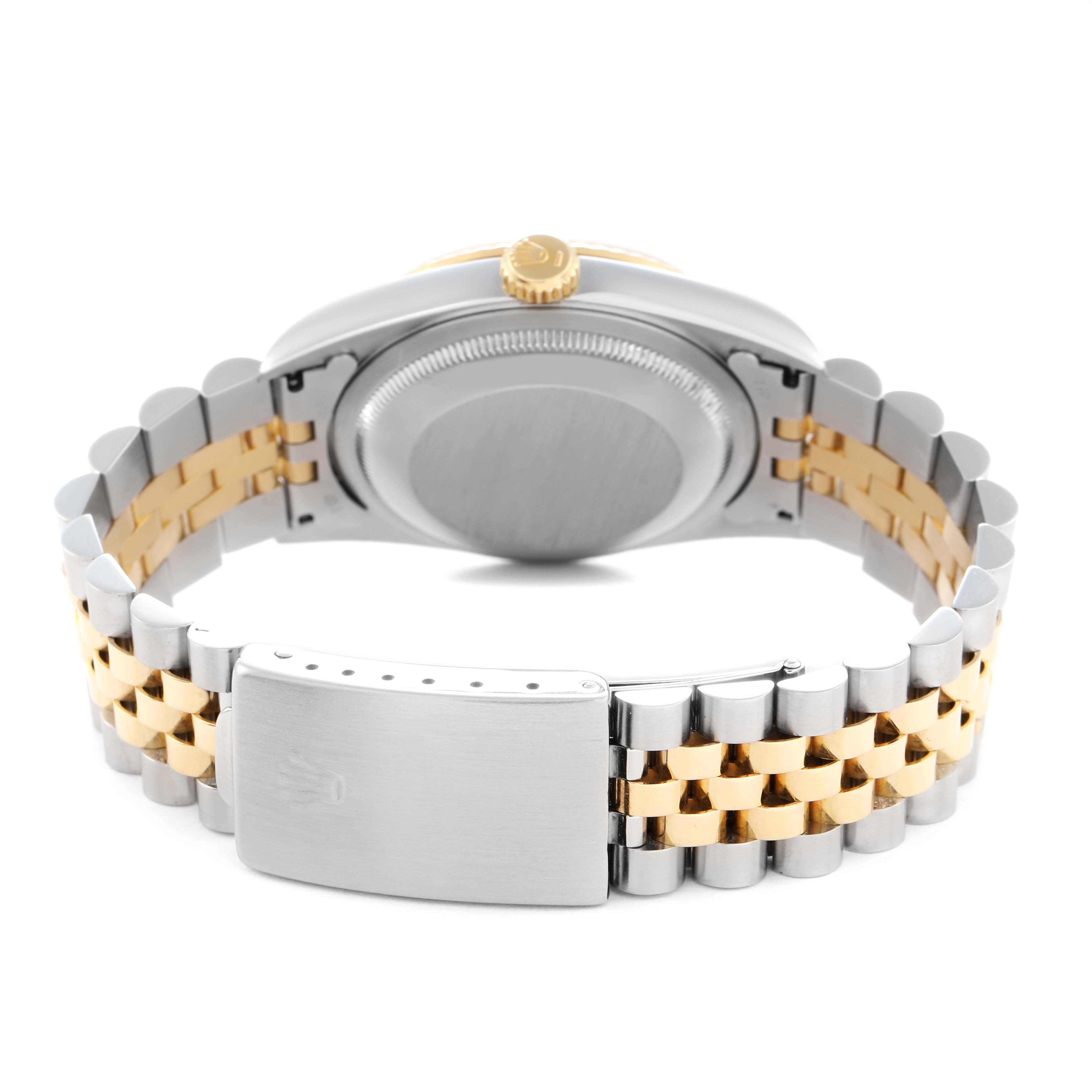 The image shows the back view of a Rolex Datejust 71081 Men
s Steel and Gold (two tone) Champagne Dial 71081 Men
s Steel and Gold (two tone) Champagne Dial, highlighting the case, crown, and two-tone bracelet with a clasp.
