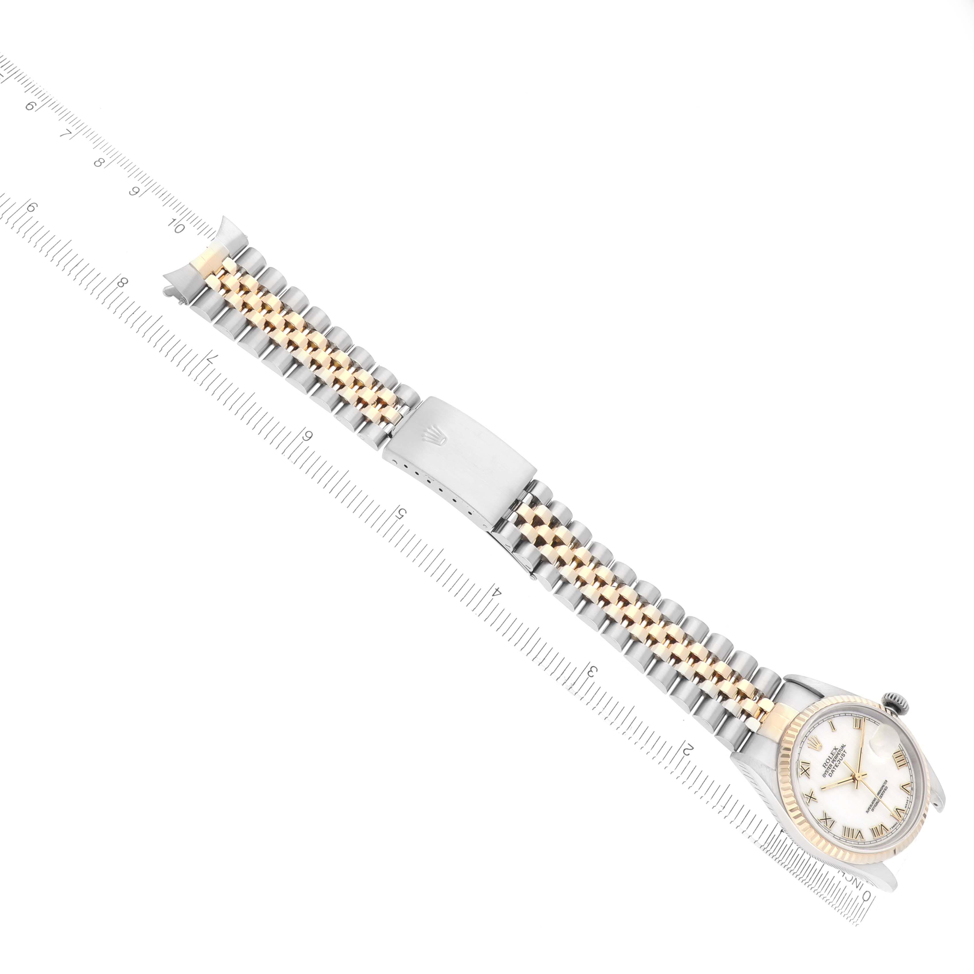 The Rolex Datejust 16233 Men
s Steel and Gold (two tone) White Dial 16233 Men
s Steel and Gold (two tone) White Dial watch is shown from a top-down angle, highlighting the two-tone bracelet and clasp.