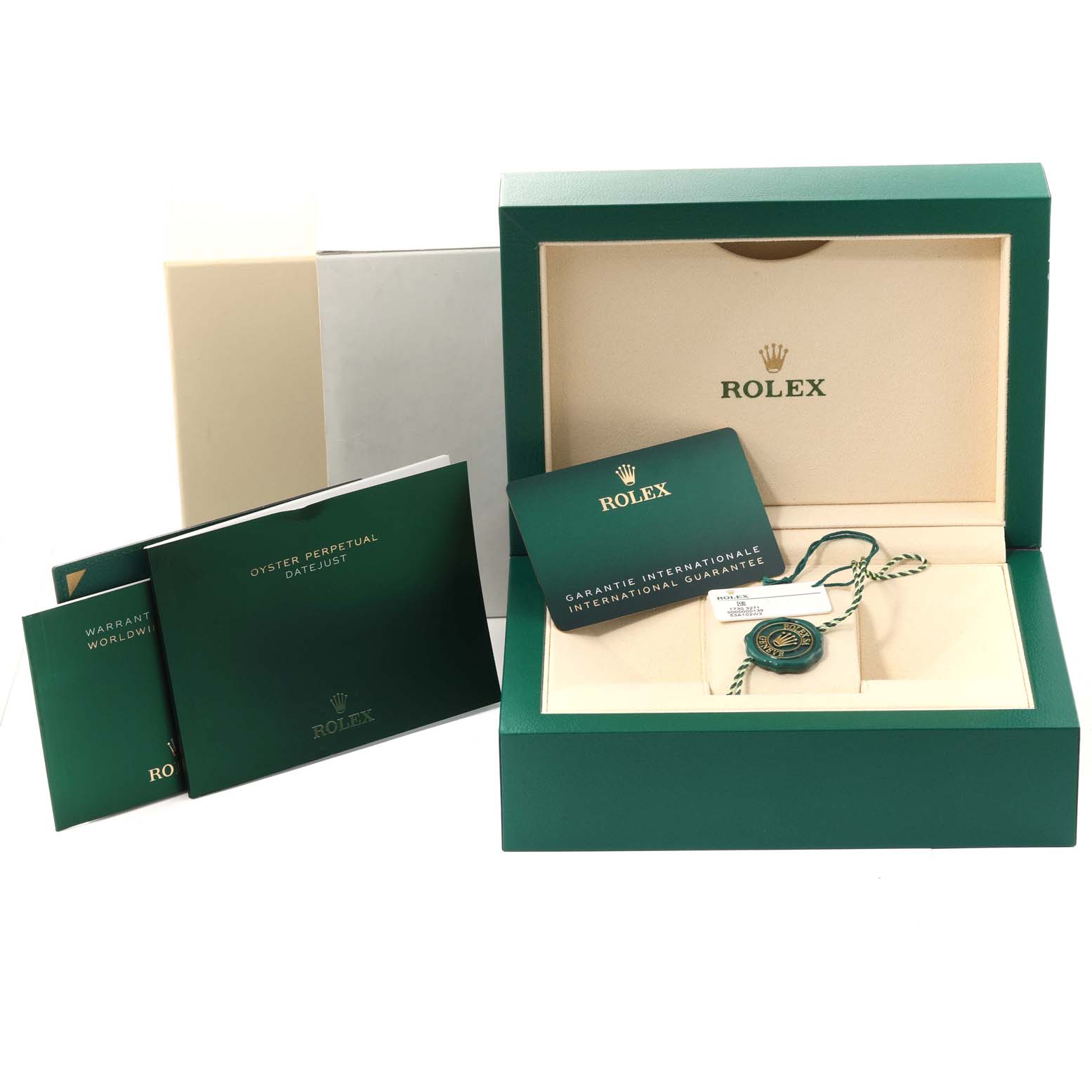 The image shows the packaging, warranty booklets, and accessories of the Rolex Datejust 41 126334 Men
s Stainless Steel Grey Dial 126334 Men
s Stainless Steel Grey Dial model.