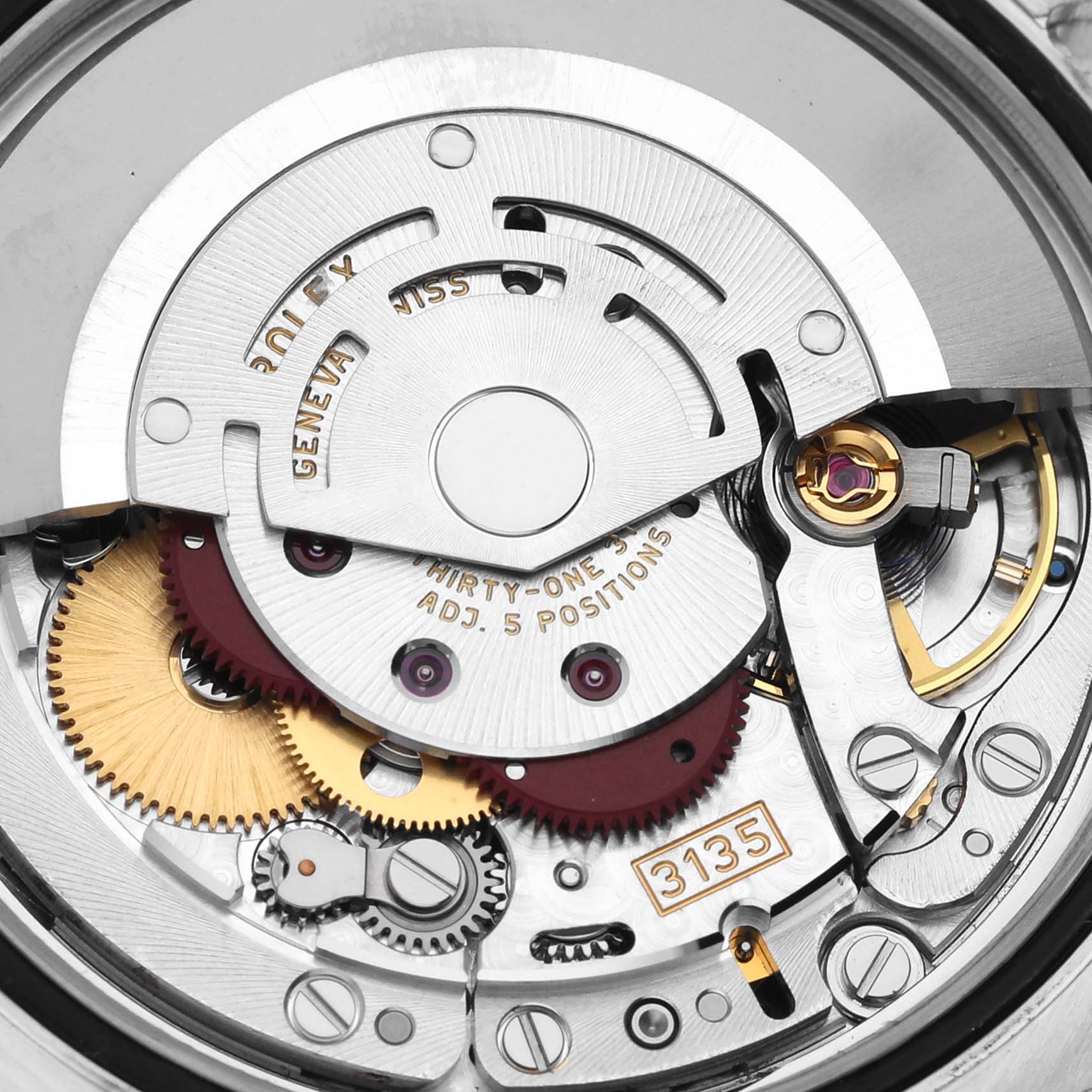 This image shows the movement mechanism of a Rolex Datejust 116243 Men's Steel and Gold (two tone) Champagne Dial 116243 Men's Steel and Gold (two tone) Champagne Dial watch, highlighting the rotor, gears, and caliber 3135.
