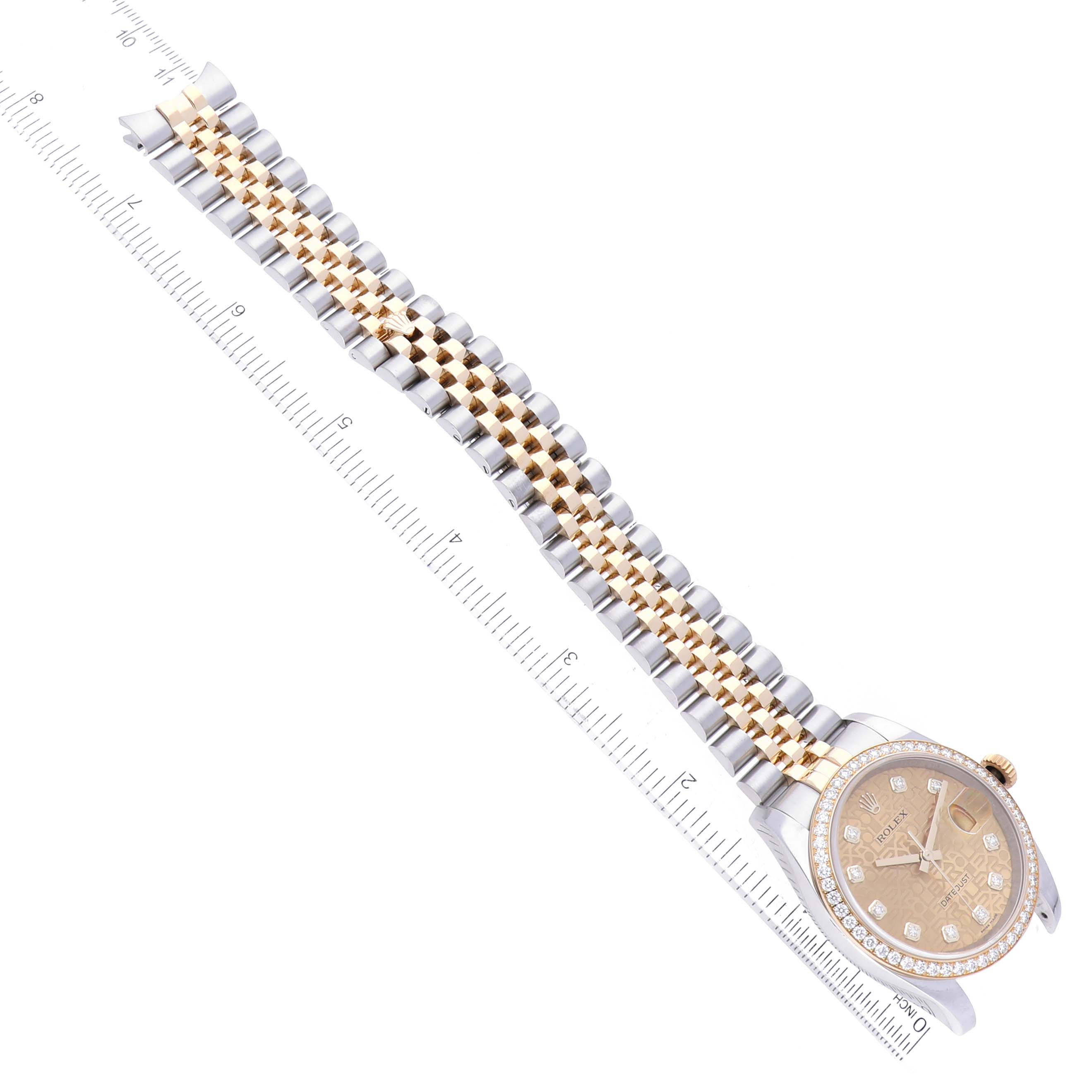 This image shows a Rolex Datejust 116243 Men's Steel and Gold (two tone) Champagne Dial 116243 Men's Steel and Gold (two tone) Champagne Dial watch at an oblique angle, highlighting the dial, bezel, and two-tone bracelet.