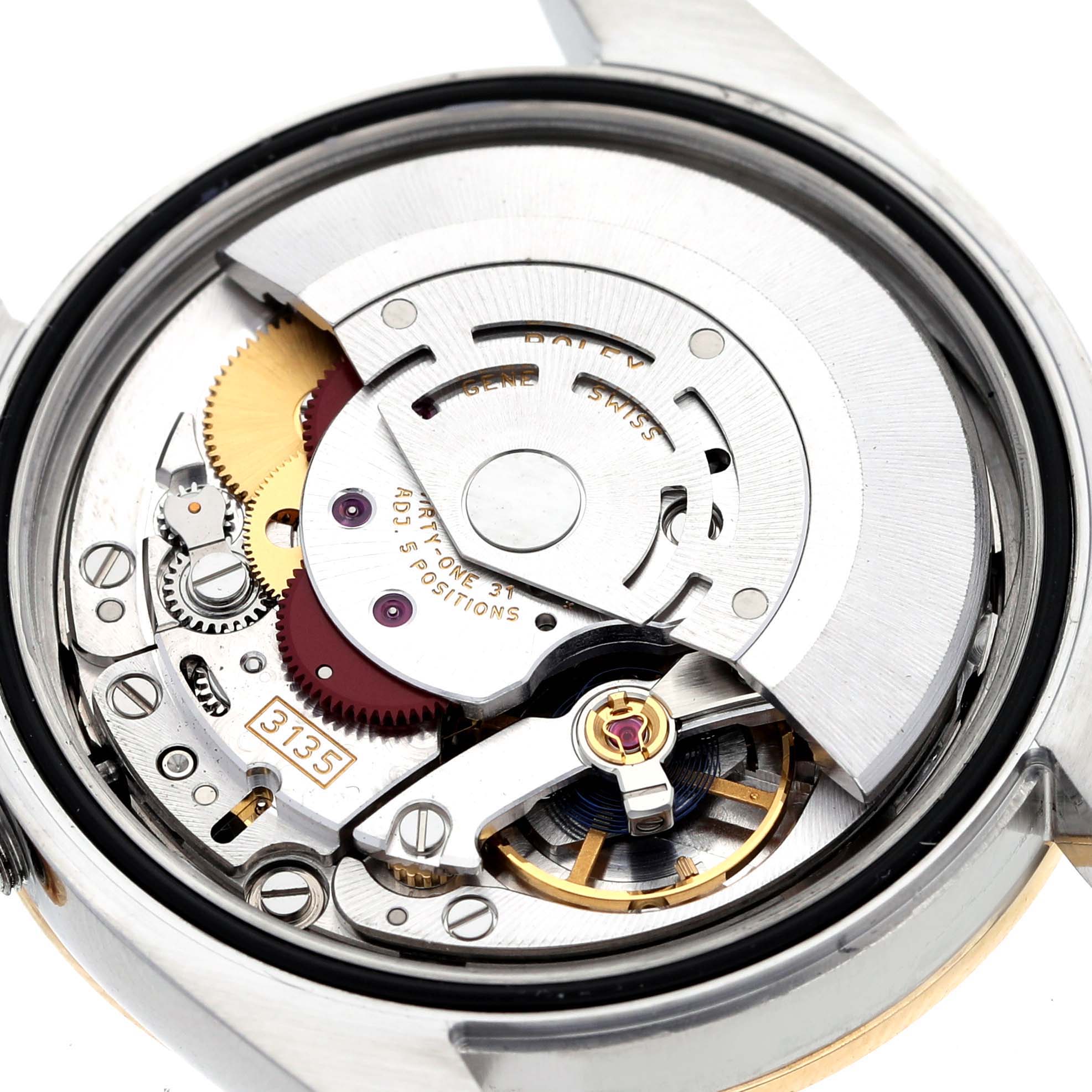 This image shows the internal mechanism and movement of a Rolex Datejust 116243 Men's Steel and Gold (two tone) Champagne Dial 116243 Men's Steel and Gold (two tone) Champagne Dial watch viewed from the back.