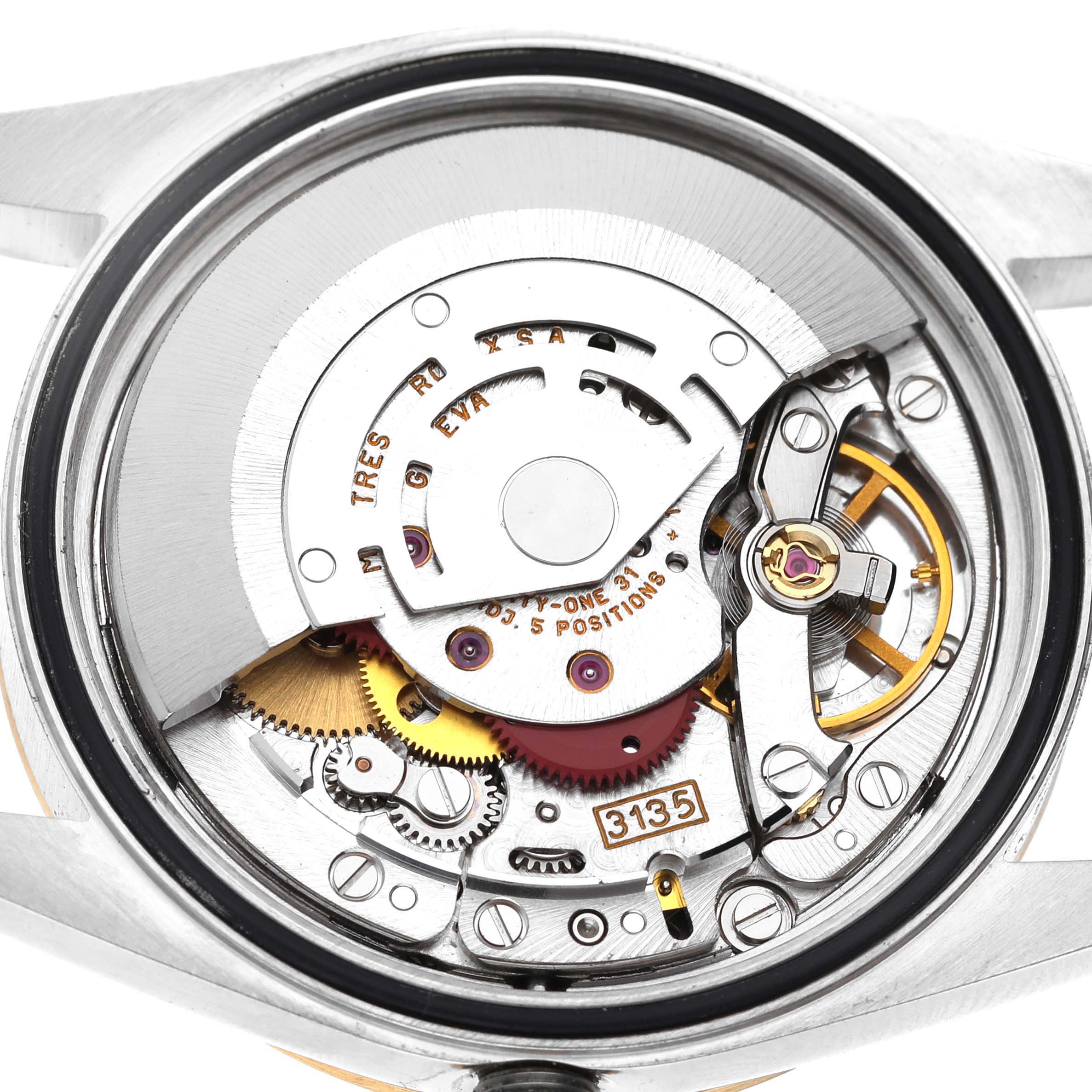 This image shows the Rolex Datejust 16233 Men's Steel and Gold (two tone) White Dial 16233 Men's Steel and Gold (two tone) White Dial's open caseback, displaying the intricate internal movement parts.