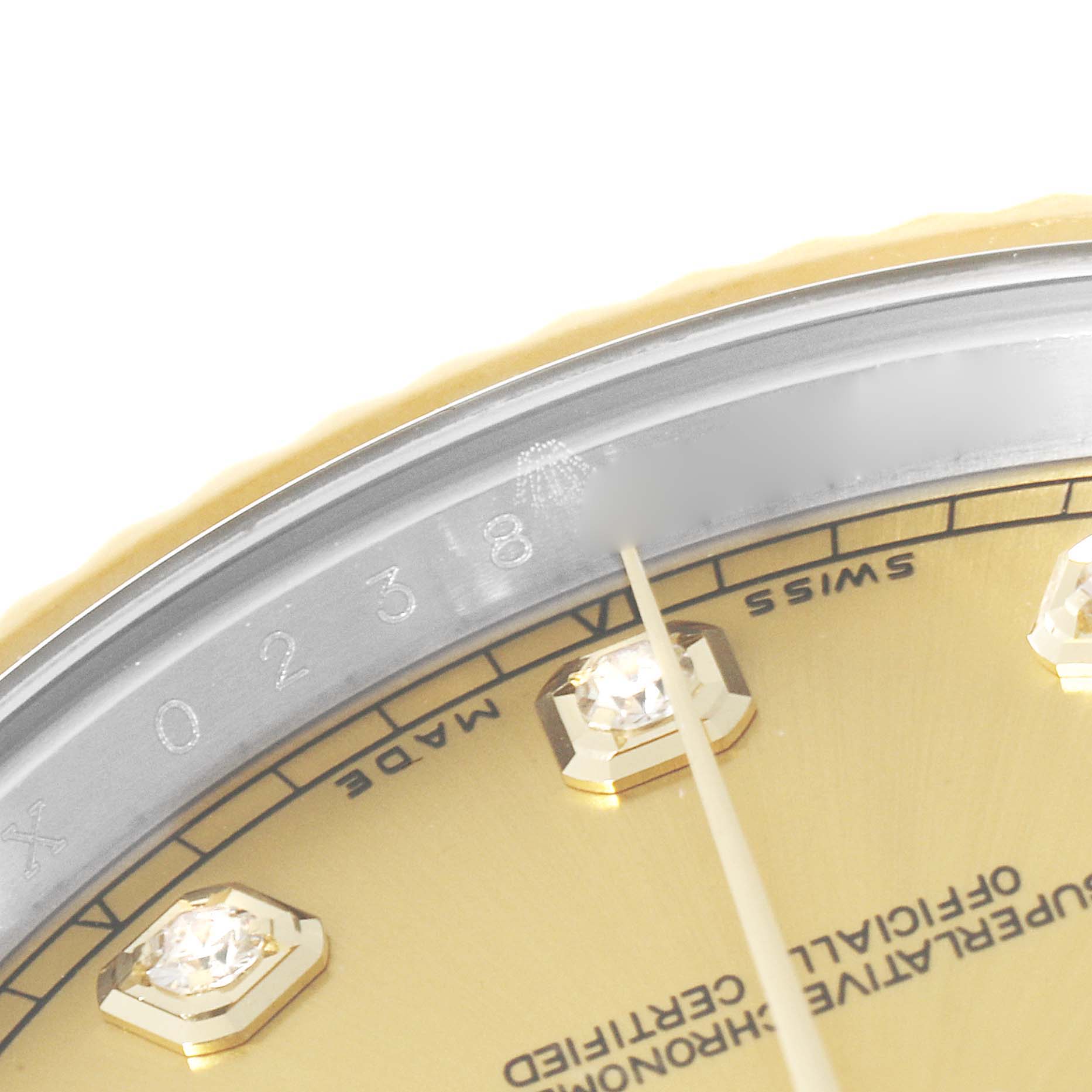 This close-up angle shows the dial, markers, and part of the inner bezel of the Rolex Datejust 41 116333 Men's Steel and Gold (two tone) Champagne Dial 116333 Men's Steel and Gold (two tone) Champagne Dial model.