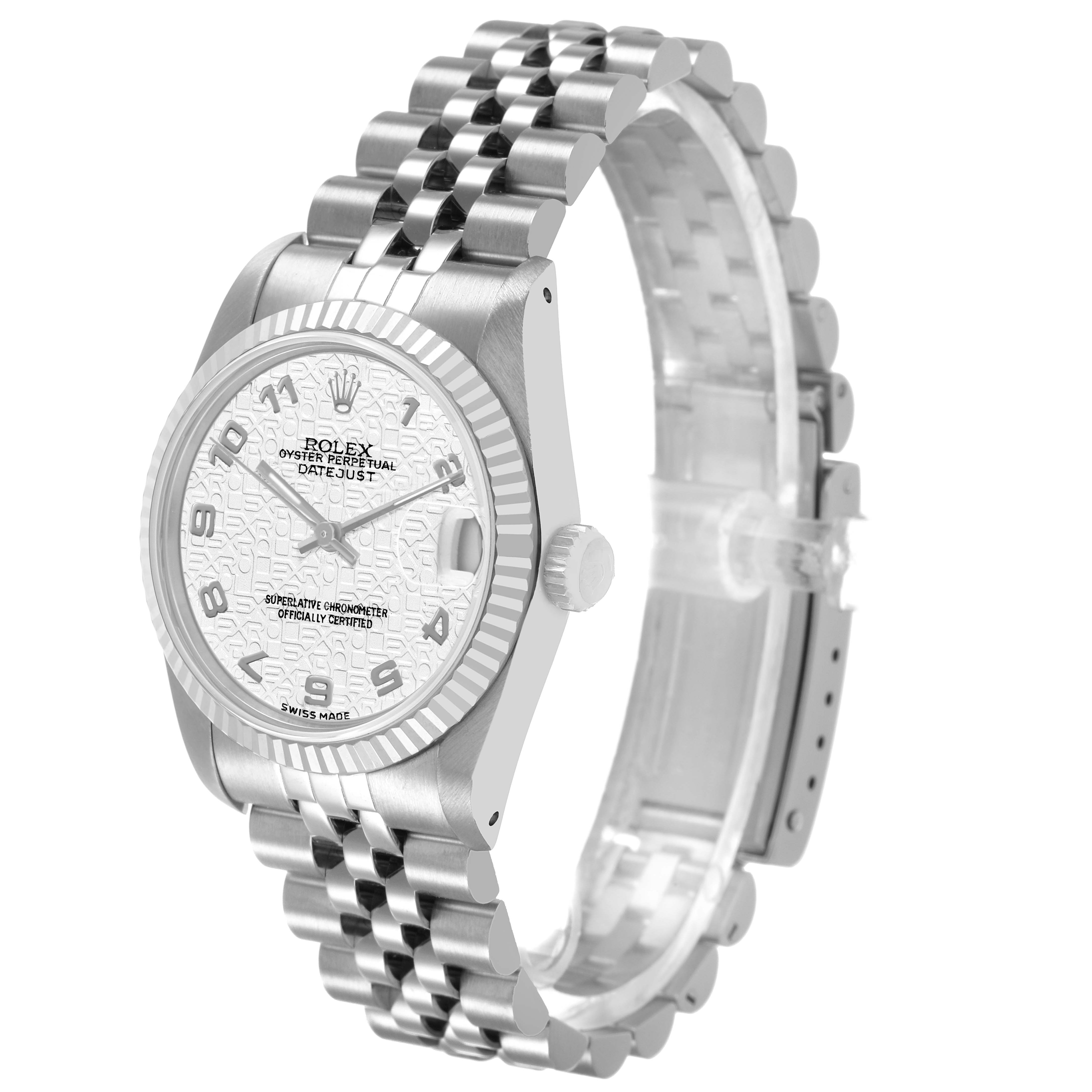 The Rolex Mid-Size 68274 Womens Stainless Steel White Dial watch is shown at a three-quarter angle, highlighting the face, bezel, and bracelet.