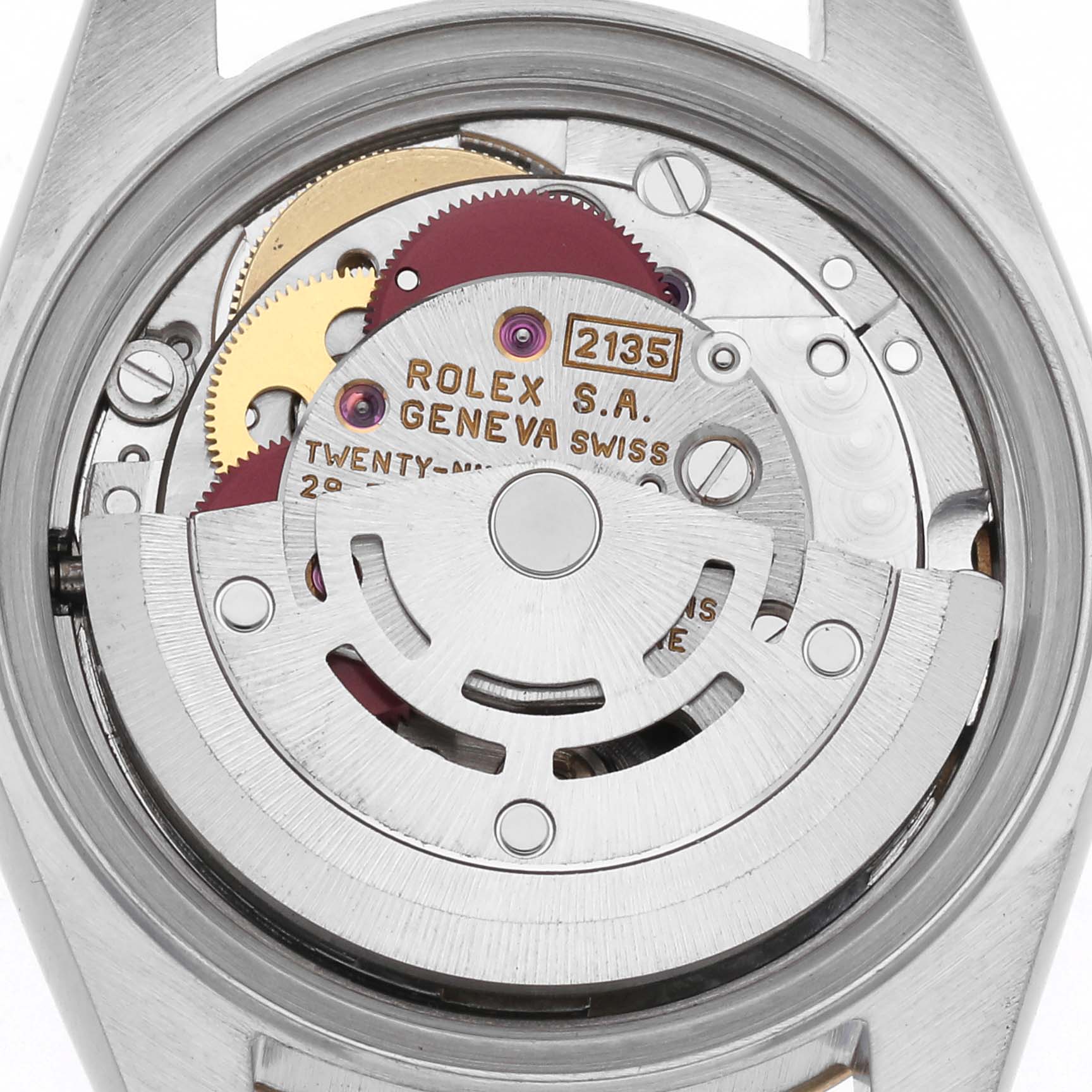 The image shows the movement and internal components of a Rolex Datejust 69173 Women
s Steel and Gold (two tone) Red Dial 69173 Women
s Steel and Gold (two tone) Red Dial watch from an open back angle.