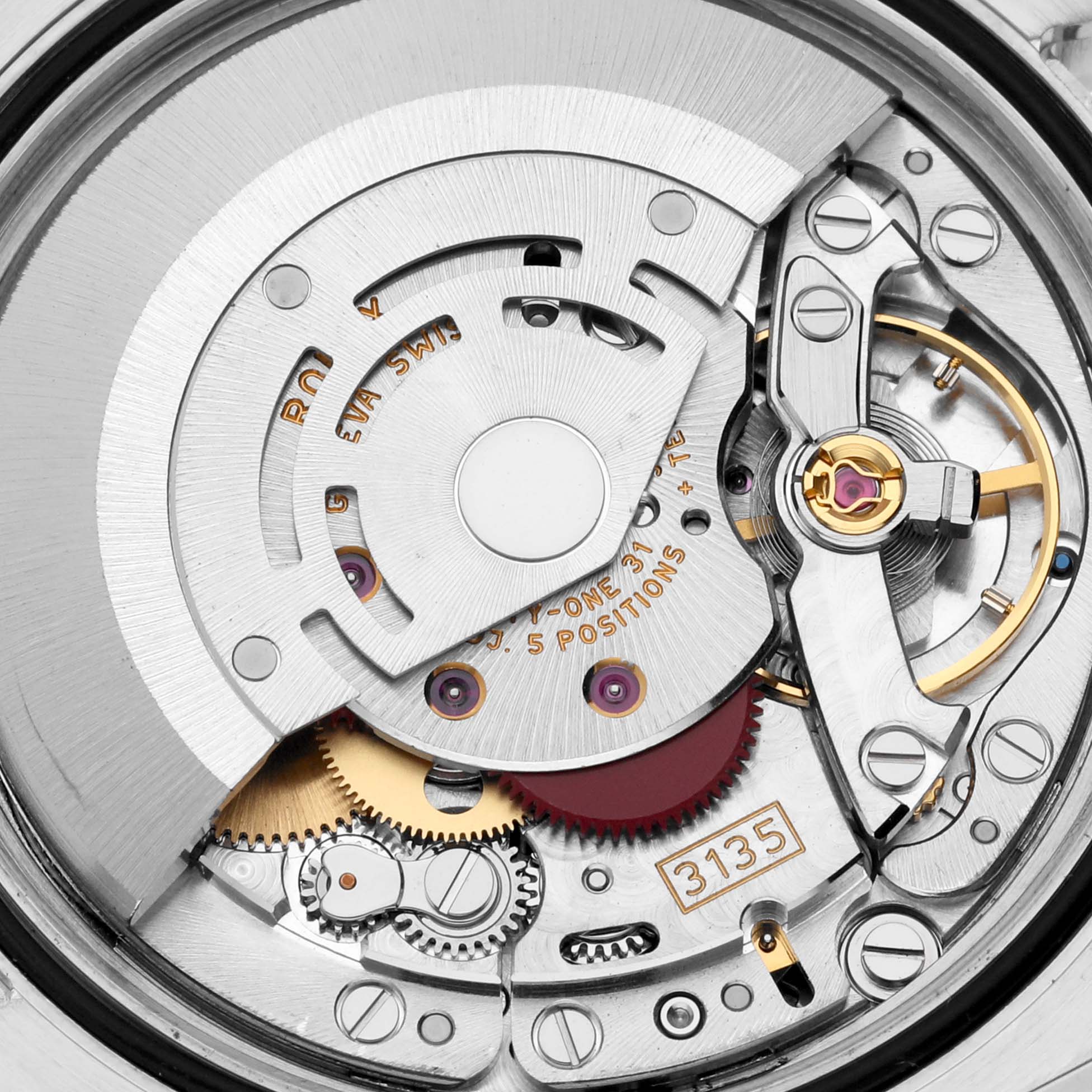 This image shows a close-up of the internal movement components of a Rolex Datejust 116200 Men
s Stainless Steel Silver Dial 116200 Men
s Stainless Steel Silver Dial watch.