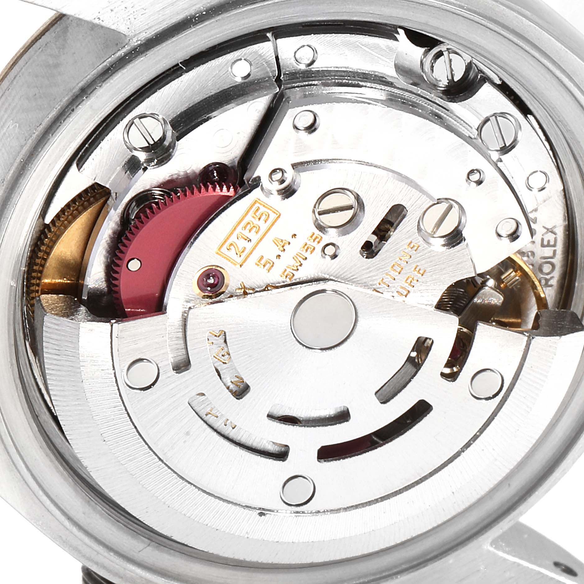 This image shows a close-up view of the movement mechanism inside a Rolex Datejust 69173 Women's Steel and Gold (two tone) Blue Dial 69173 Women's Steel and Gold (two tone) Blue Dial watch, highlighting its intricate components.