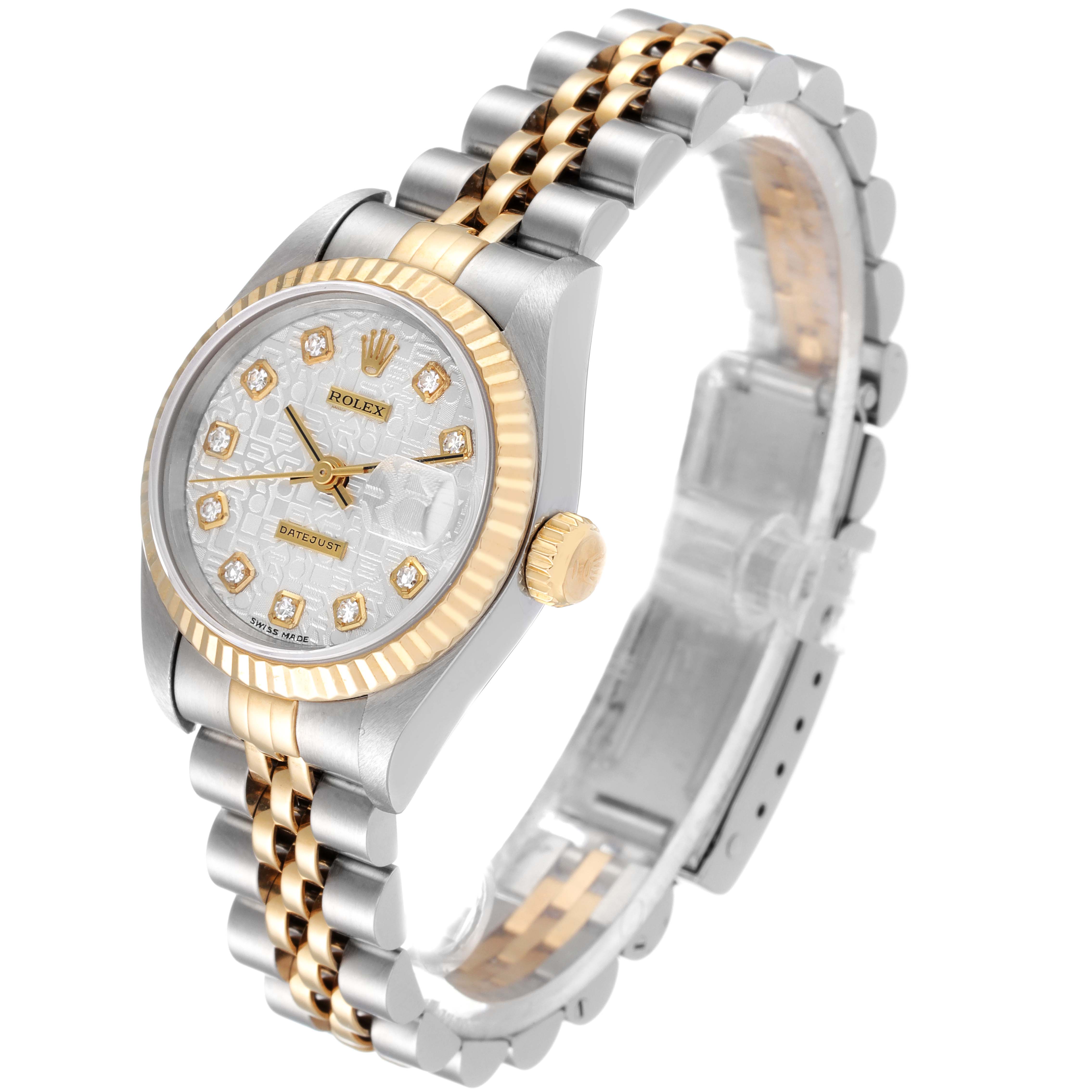 The Rolex Datejust 69173 Women
s Steel and Gold (two tone) Silver Dial 69173 Women
s Steel and Gold (two tone) Silver Dial watch is shown at an oblique angle, highlighting its dial, fluted bezel, and two-tone bracelet.