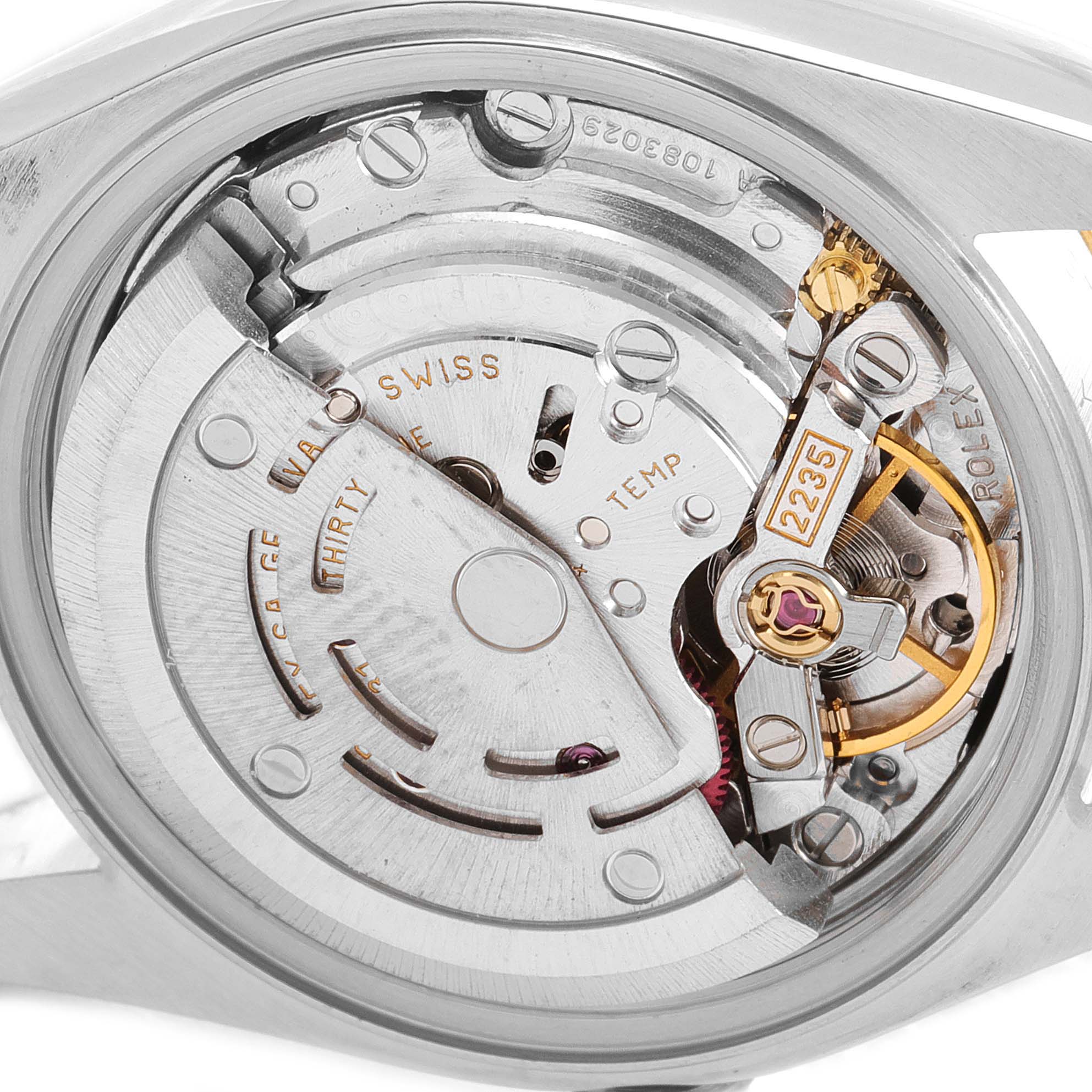 This image shows the intricate internal mechanism or movement of the Rolex Datejust 79173 Women
s Steel and Gold (two tone) Black Dial 79173 Women
s Steel and Gold (two tone) Black Dial watch.