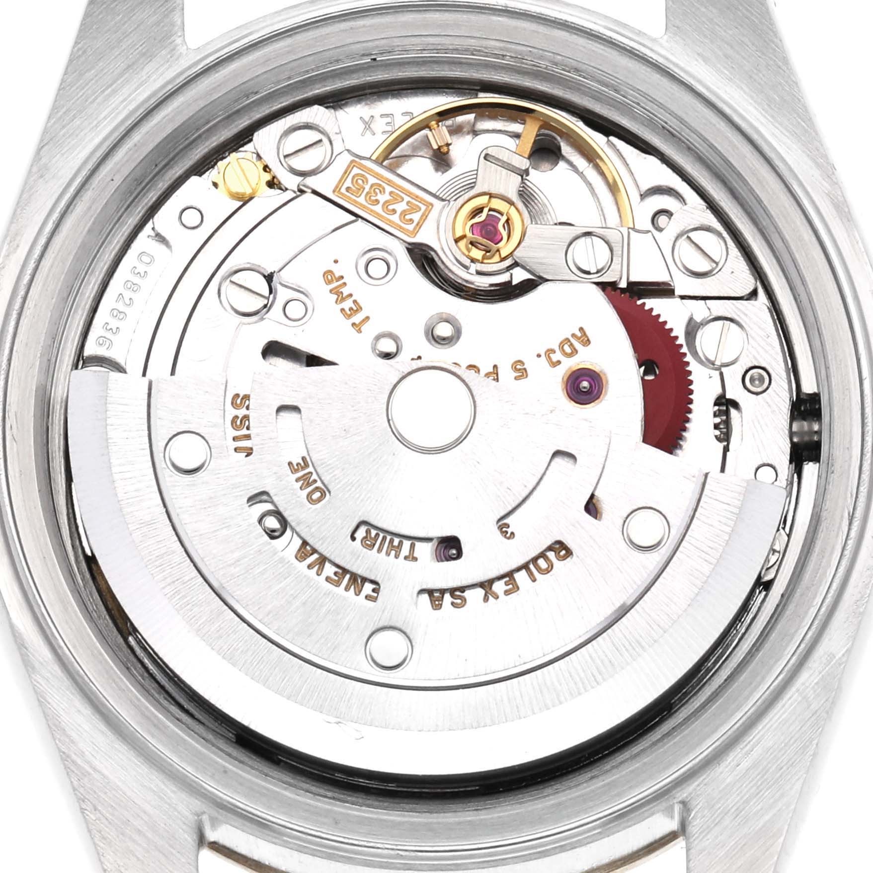 The image shows the movement mechanism of a Rolex Datejust 79173 Women
s Steel and Gold (two tone) Champagne Dial 79173 Women
s Steel and Gold (two tone) Champagne Dial watch from a top-down angle, highlighting gears and rotors.