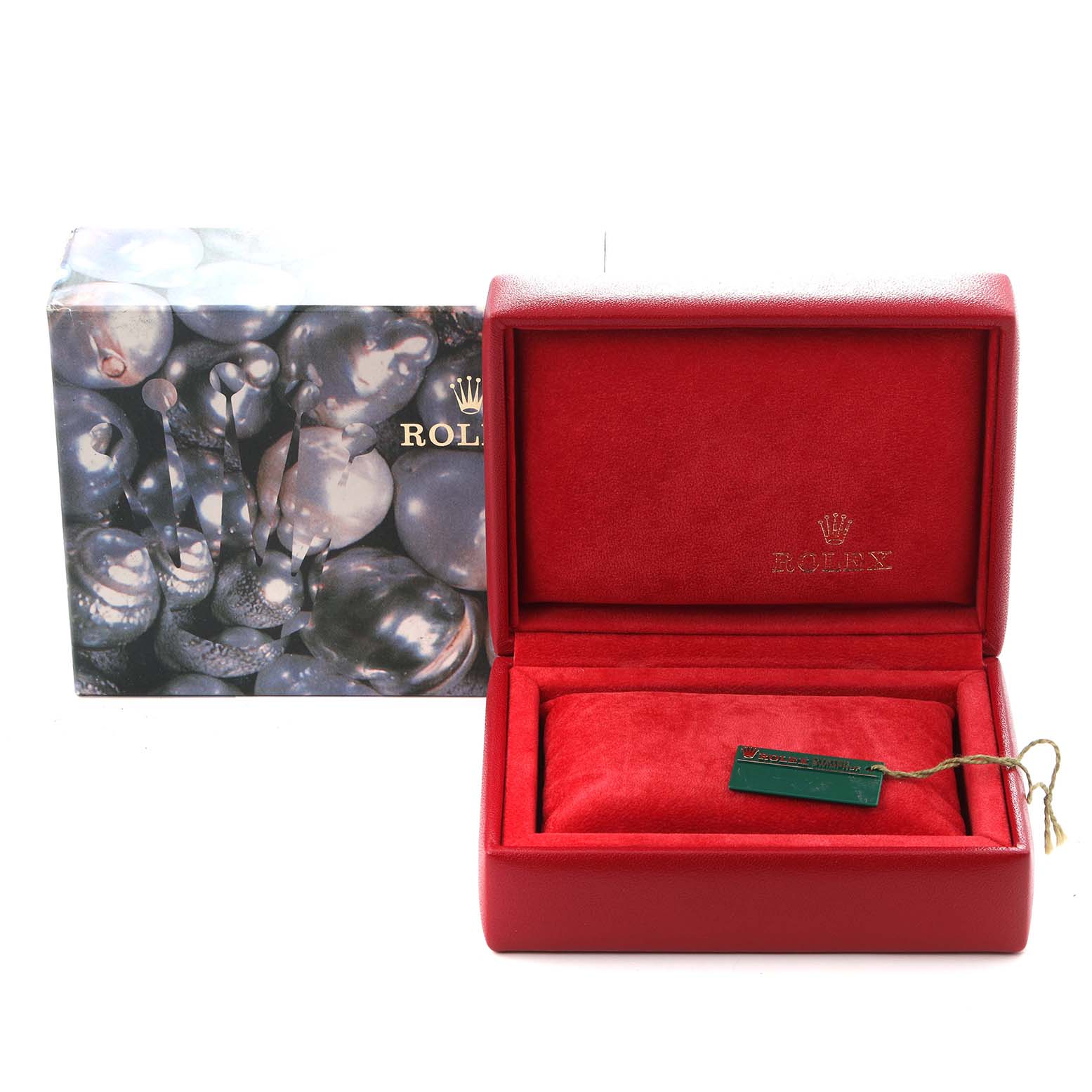 The image shows an open Rolex Datejust 79173 Women
s Steel and Gold (two tone) Champagne Dial 79173 Women
s Steel and Gold (two tone) Champagne Dial watch box, featuring a red interior and a tag, with a decorative outer box beside it.