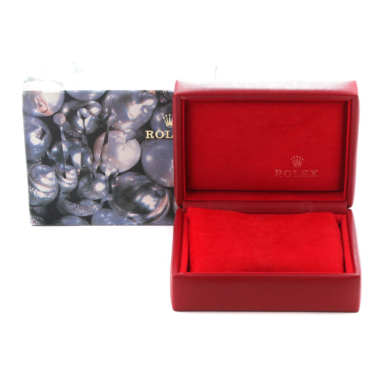 The image shows a Rolex Datejust 79173 Women
s Steel and Gold (two tone) Champagne Dial 79173 Women
s Steel and Gold (two tone) Champagne Dial watch box and cushion, viewed from the front, with a decorative outer box.