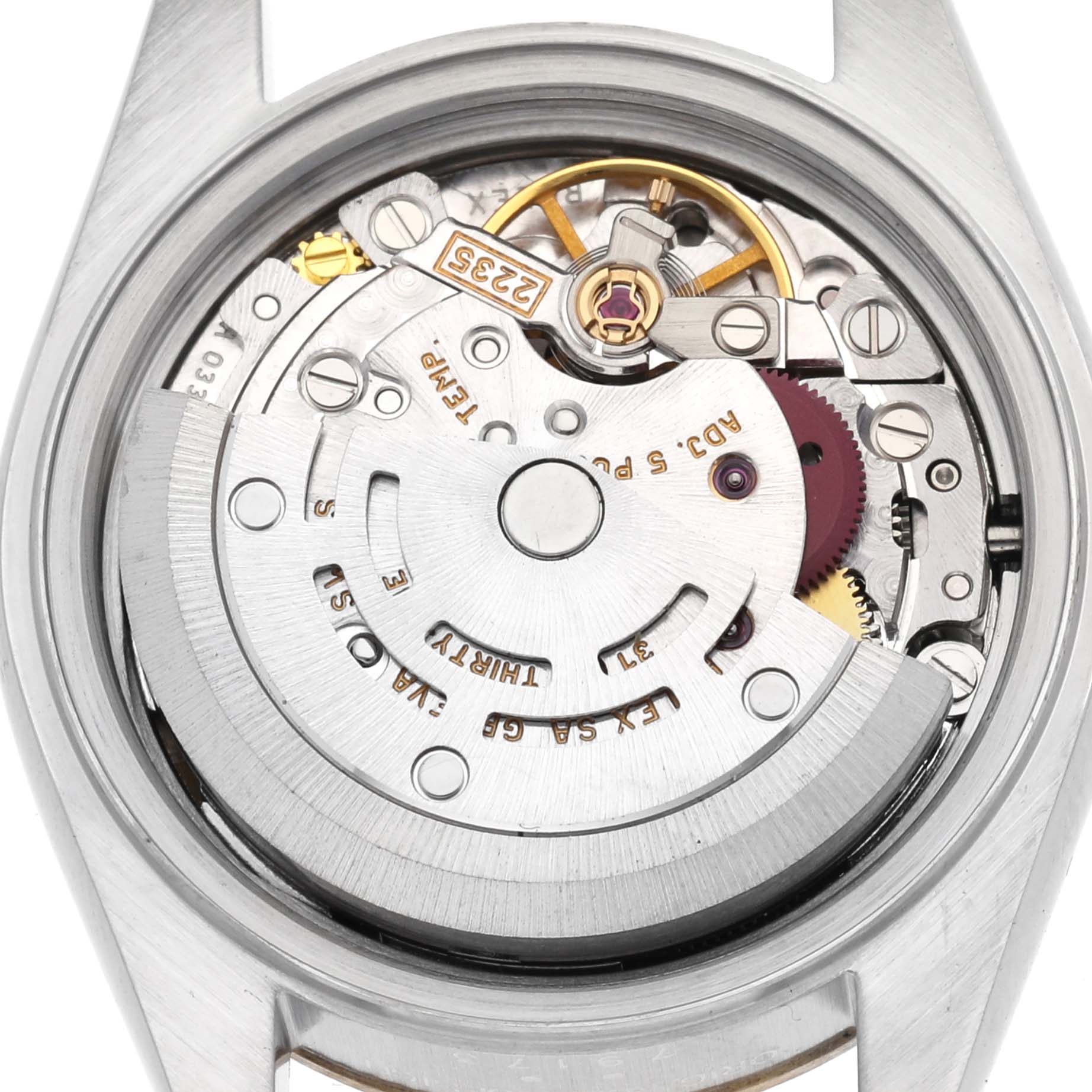 The image shows the movement and inner workings of a Rolex Datejust 79173 Women
s Steel and Gold (two tone) Champagne Dial 79173 Women
s Steel and Gold (two tone) Champagne Dial watch from a direct top-down angle.