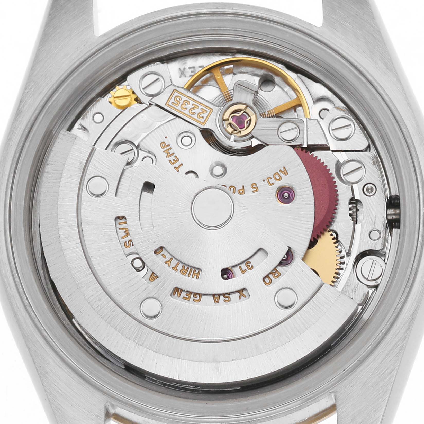 The image shows the movement of the Rolex Datejust 79173 Women
s Steel and Gold (two tone) Champagne Dial 79173 Women
s Steel and Gold (two tone) Champagne Dial watch viewed from the back, highlighting the rotor and internal components.