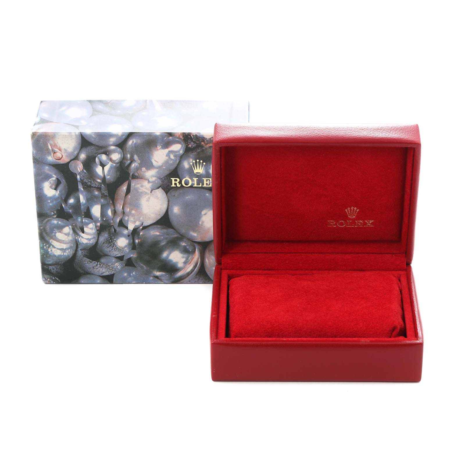 The image shows a Rolex Datejust 79173 Women
s Steel and Gold (two tone) Champagne Dial 79173 Women
s Steel and Gold (two tone) Champagne Dial watch box and packaging, with a red interior and a decorative exterior box.