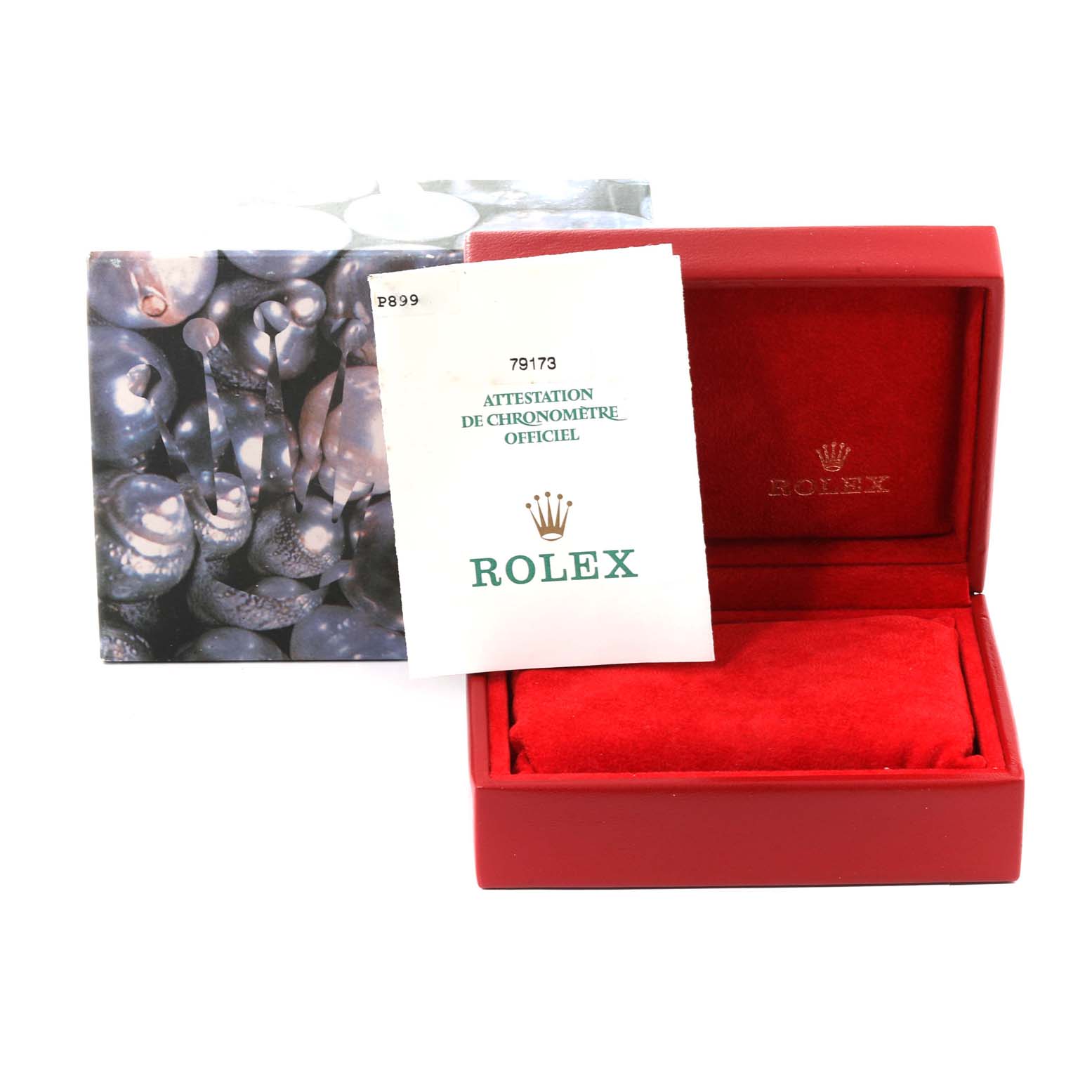 This image shows the box and paperwork for a Rolex Datejust 79173G Women's Steel and Gold (two tone) Champagne Dial 79173G Women's Steel and Gold (two tone) Champagne Dial watch, viewed from the front.