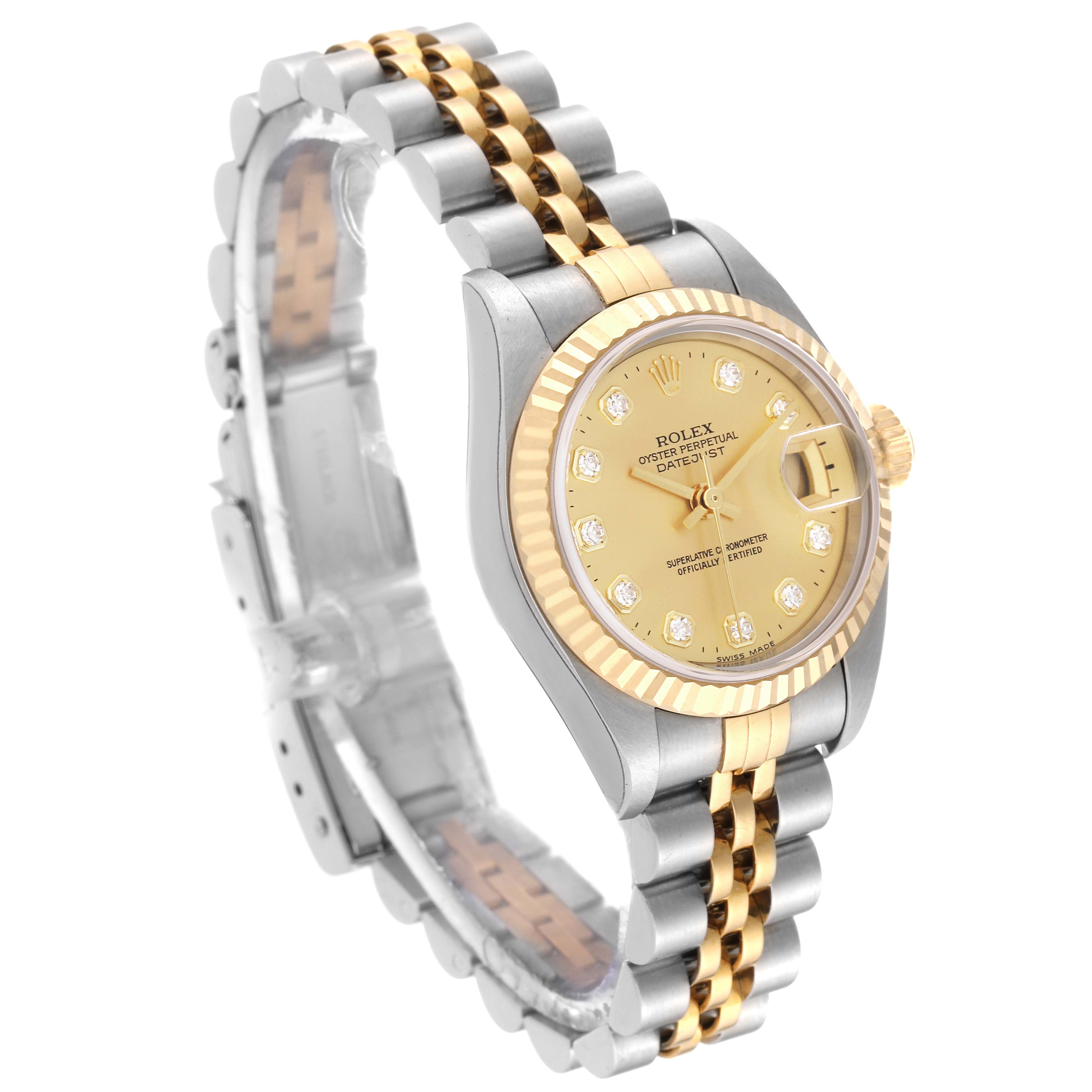 The image shows a Rolex Datejust 79173G Women's Steel and Gold (two tone) Champagne Dial 79173G Women's Steel and Gold (two tone) Champagne Dial watch at a three-quarter angle, highlighting its gold and silver bracelet, fluted bezel, and diamond dial.