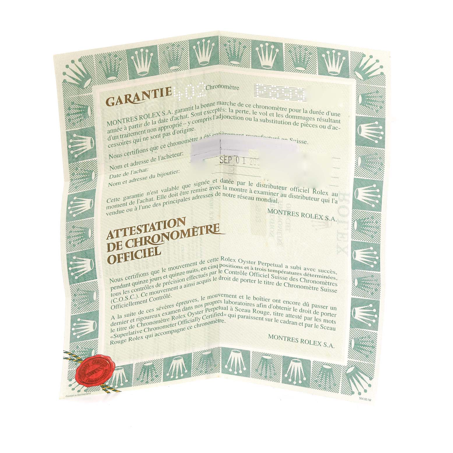 This image shows the warranty and certification document for a Datejust model by Rolex, taken from a top-down angle.