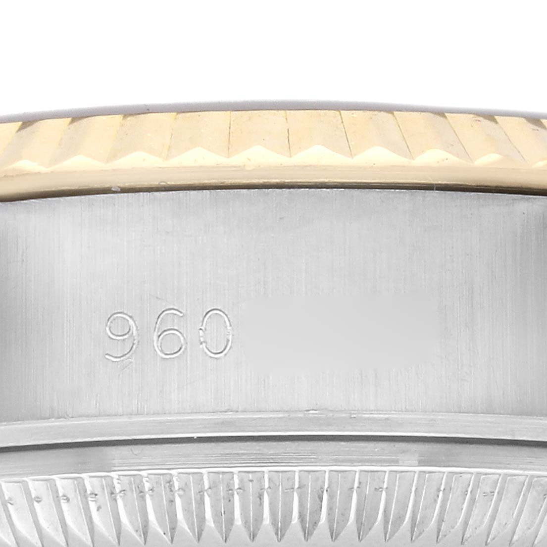 The image shows a close-up of the side of a Rolex Datejust 69173 Women
s Steel and Gold (two tone) Champagne Dial 69173 Women
s Steel and Gold (two tone) Champagne Dial, focusing on the edge of the case and bezel.