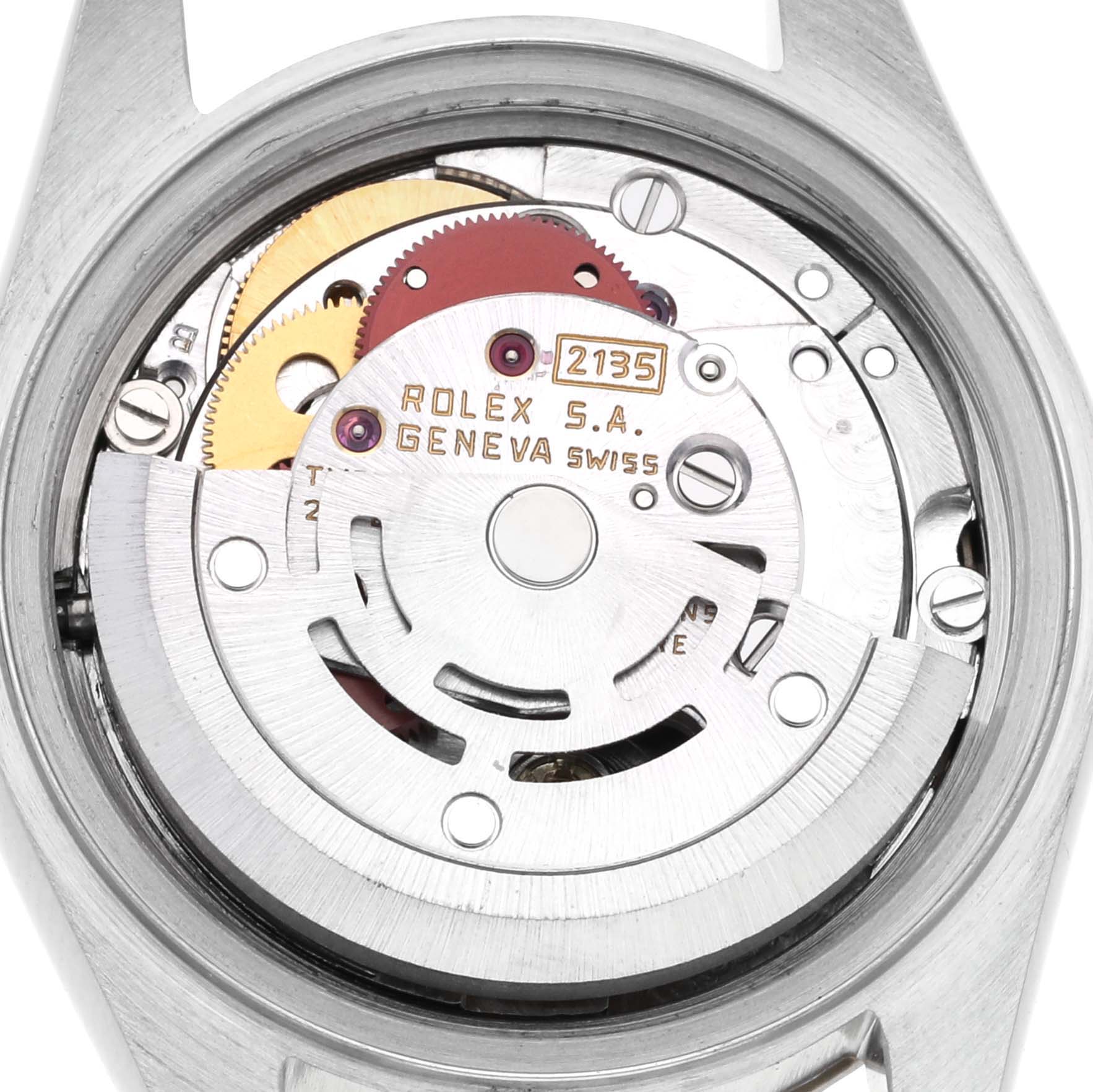 The image shows the Rolex Datejust 69173 Women
s Steel and Gold (two tone) Champagne Dial 69173 Women
s Steel and Gold (two tone) Champagne Dial
s movement from the back, highlighting the rotor and internal components.