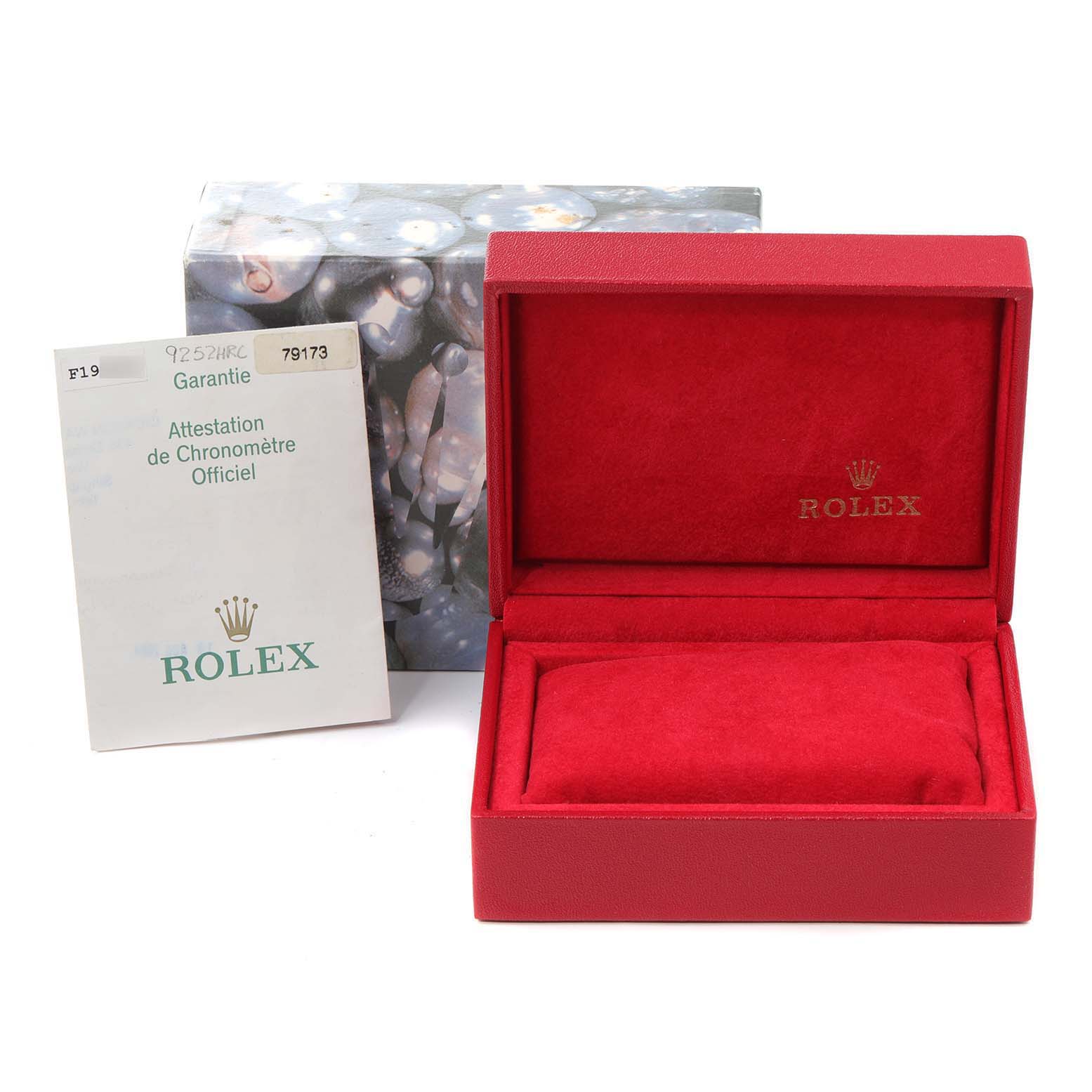 The image shows the packaging and official documentation for a Rolex Datejust 79173 Women
s Steel and Gold (two tone) Champagne Dial 79173 Women
s Steel and Gold (two tone) Champagne Dial watch, featuring a red box and warranty card.