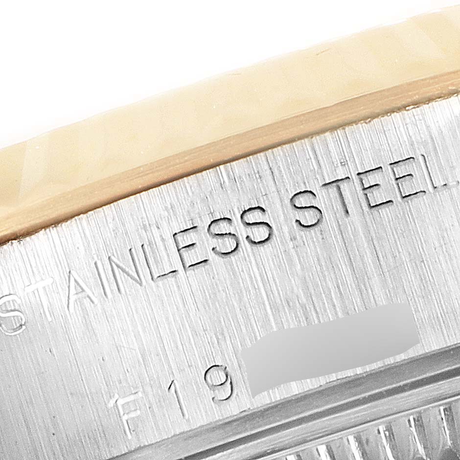 This image shows a close-up of the stainless steel case side of a Rolex Datejust 79173 Women
s Steel and Gold (two tone) Champagne Dial 79173 Women
s Steel and Gold (two tone) Champagne Dial watch.