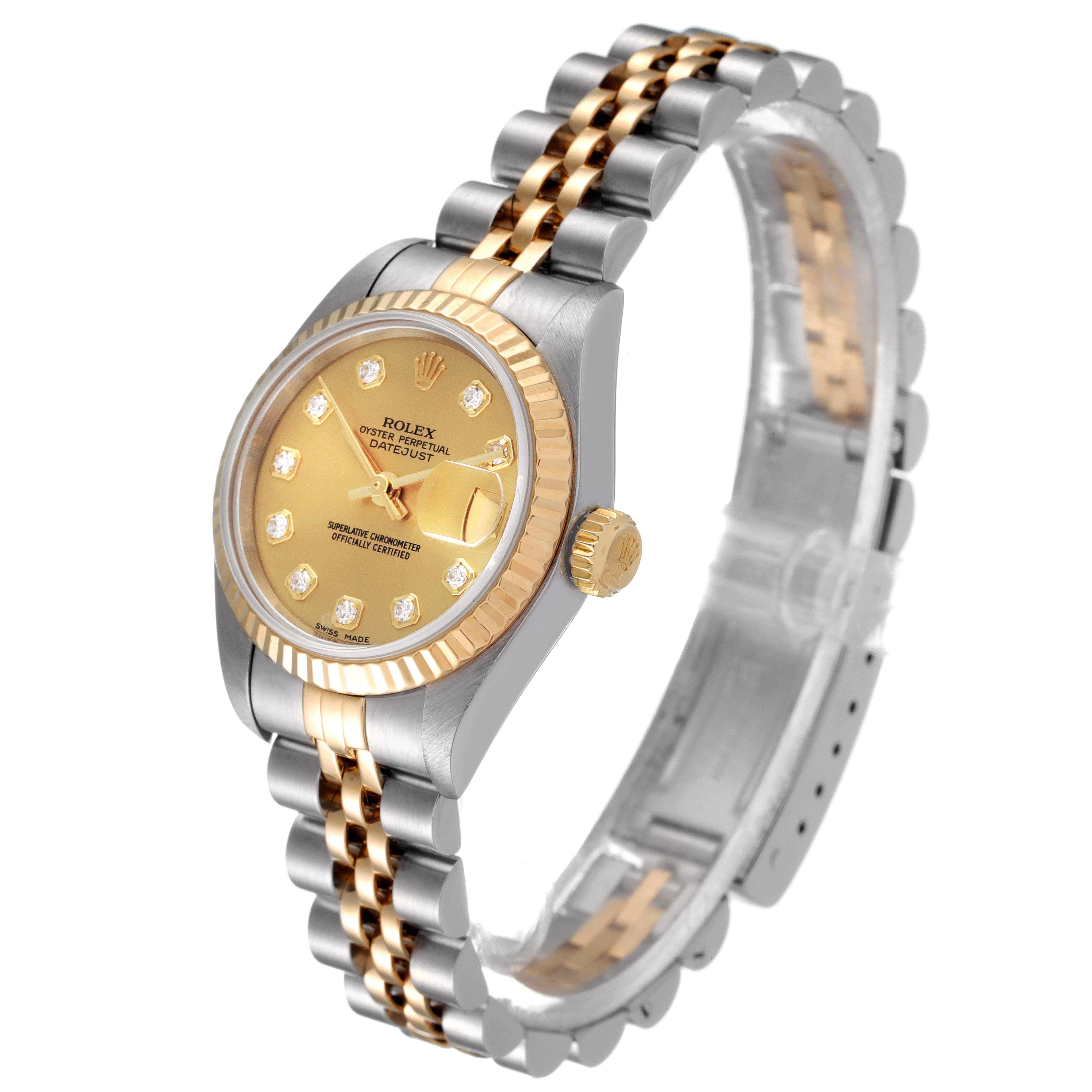 This Rolex Datejust 79173 Women
s Steel and Gold (two tone) Champagne Dial 79173 Women
s Steel and Gold (two tone) Champagne Dial watch is shown at an angle highlighting the dial, bezel, case, and the two-tone Jubilee bracelet.