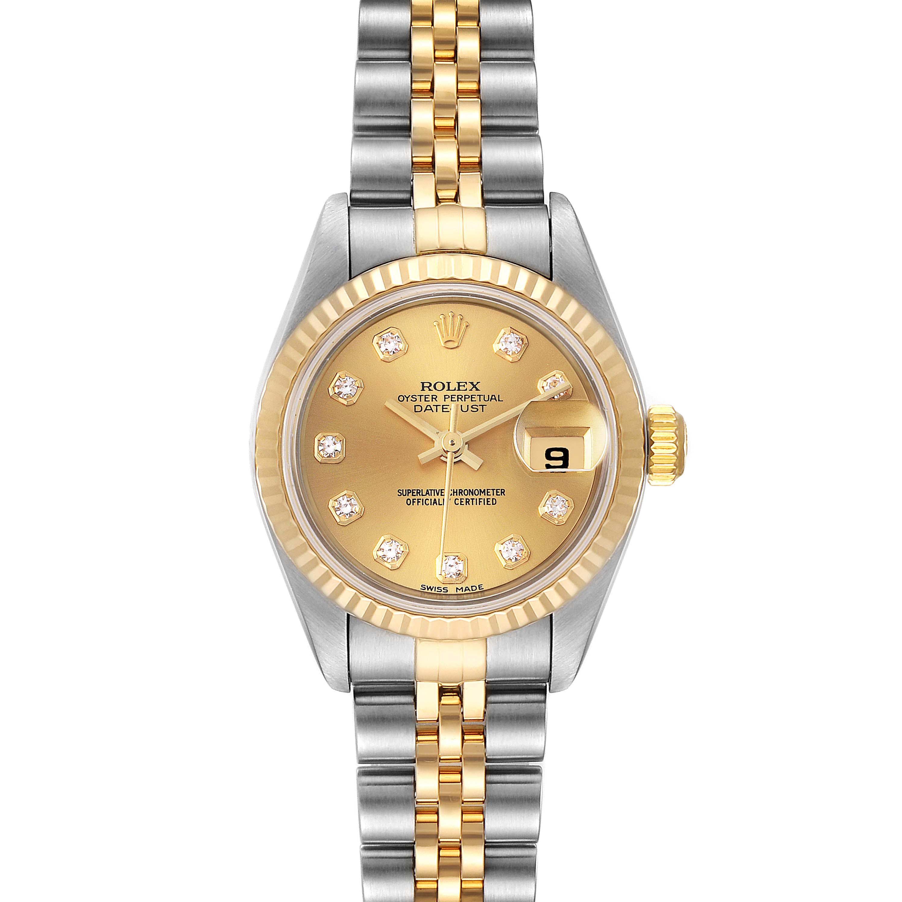 The Rolex Datejust 79173 Women
s Steel and Gold (two tone) Champagne Dial 79173 Women
s Steel and Gold (two tone) Champagne Dial watch is shown from a front angle, highlighting its gold dial, fluted bezel, and two-tone bracelet.