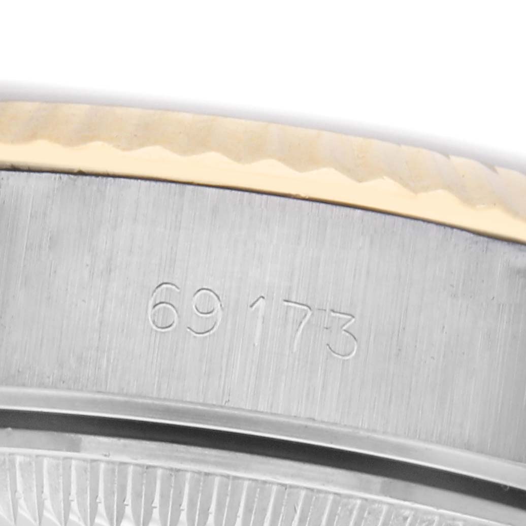 The image shows a close-up of the bezel and case of the Rolex Datejust 69173 Women
s Steel and Gold (two tone) Beige Dial 69173 Women
s Steel and Gold (two tone) Beige Dial, highlighting the model number "69173".