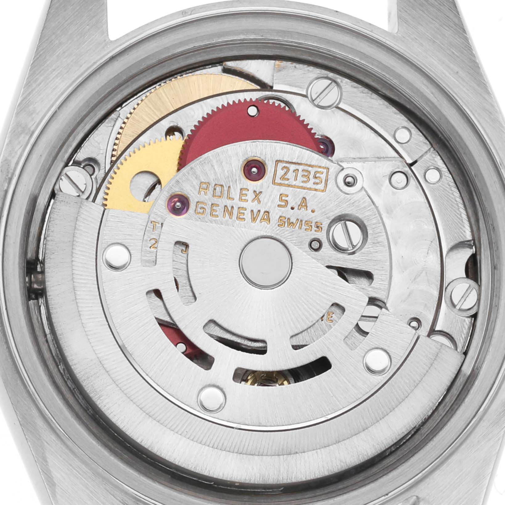 The image shows the movement of a Rolex Datejust 69173 Women
s Steel and Gold (two tone) Beige Dial 69173 Women
s Steel and Gold (two tone) Beige Dial watch, highlighting gears and inscriptions at a close-up angle.