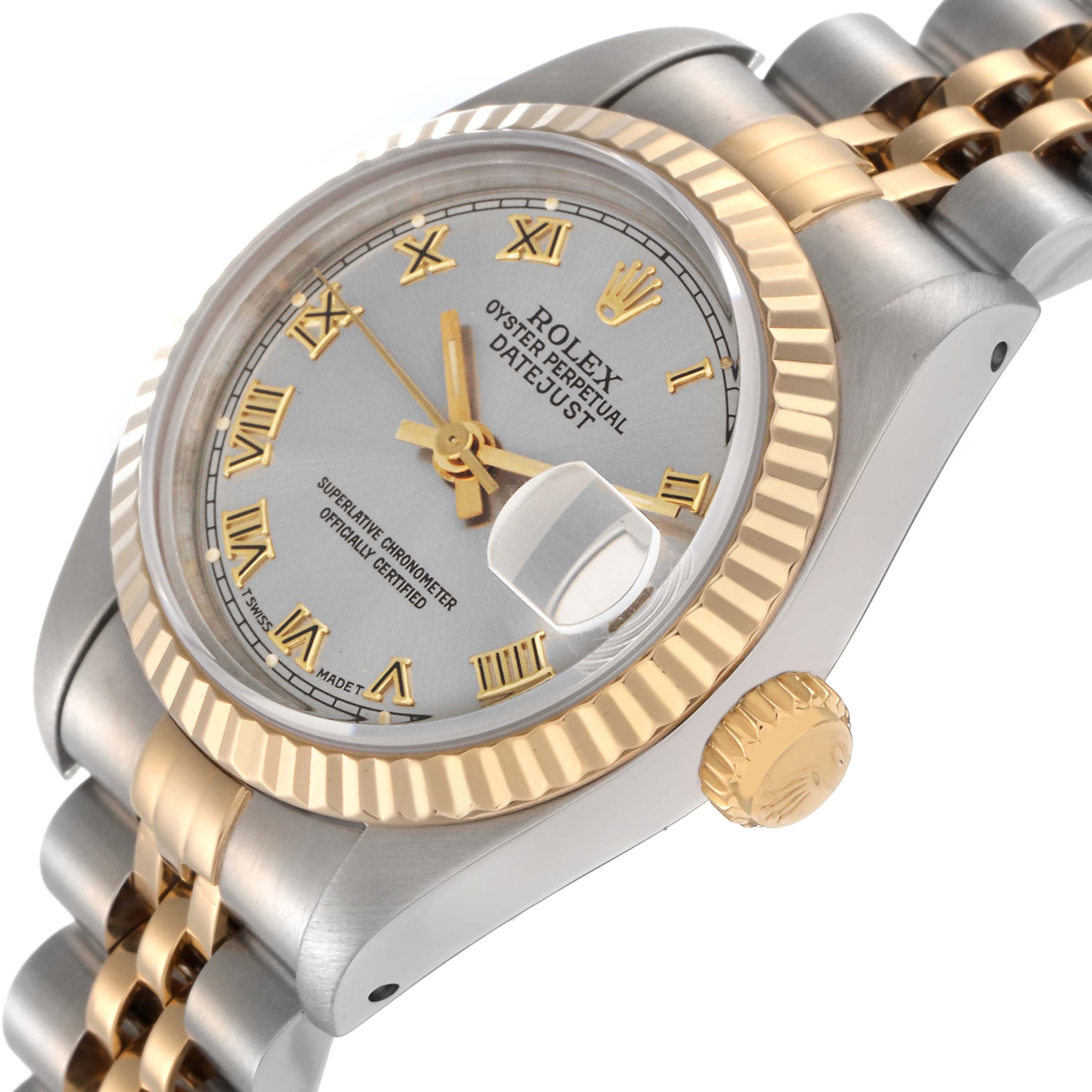 The Rolex Datejust 69173 Women
s Steel and Gold (two tone) Grey Dial 69173 Women
s Steel and Gold (two tone) Grey Dial watch is shown at a three-quarter angle, highlighting the bezel, crown, dial, and part of the bracelet.
