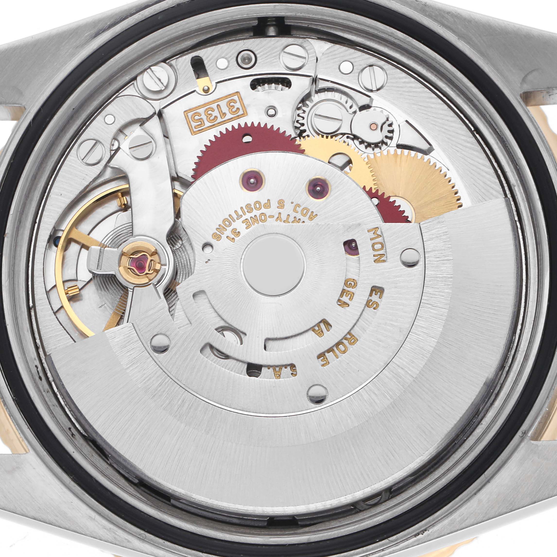 The image shows the movement of the Rolex Turn-o-Graph 16263 Men
s Steel and Gold (two tone) Black Dial 16263 Men
s Steel and Gold (two tone) Black Dial watch, viewed from the back, highlighting the gears and rotor.