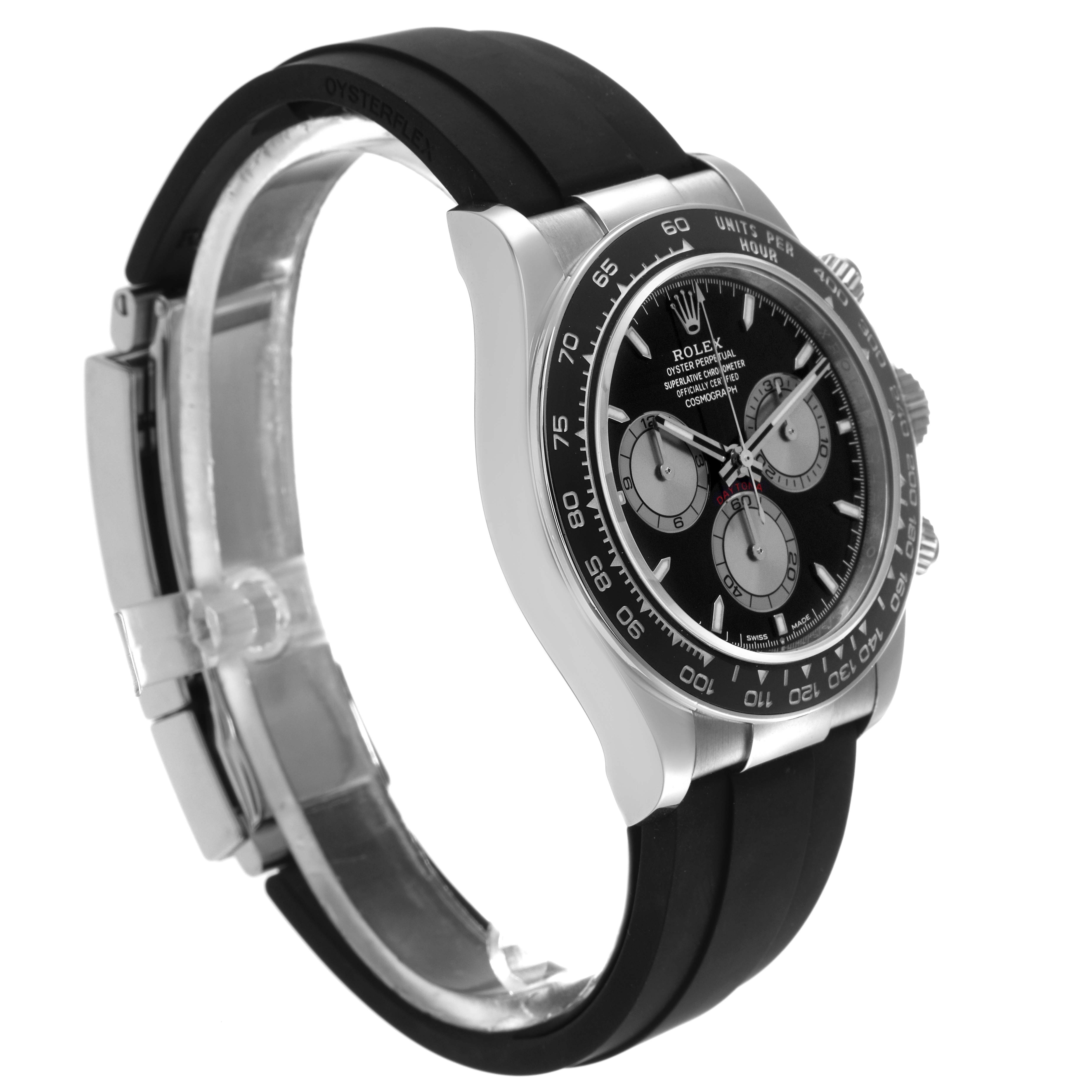 The Rolex Daytona 126519 Men
s White Gold Black Dial 126519 Men
s White Gold Black Dial watch is shown at a three-quarter angle, displaying the face, bezel, pushers, and rubber strap clearly.