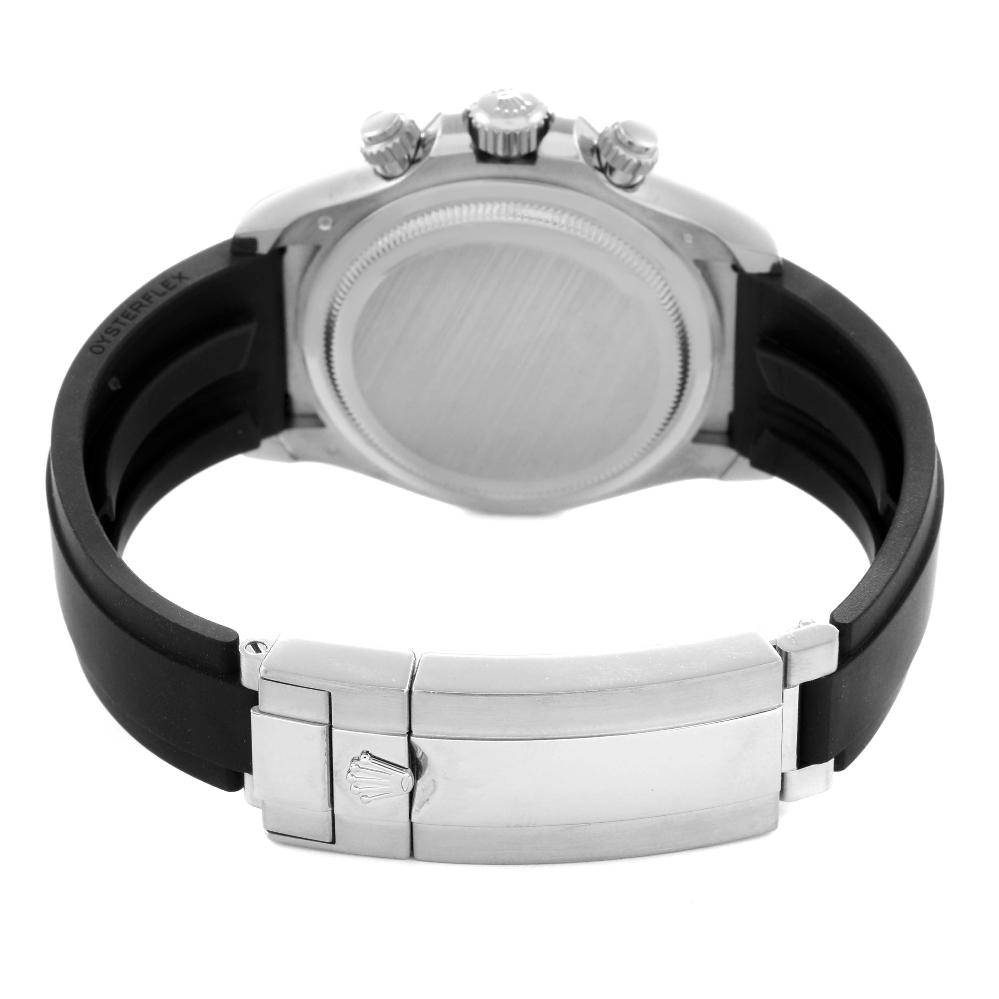 The image shows the back of a Rolex Daytona 126519 Men
s White Gold Black Dial 126519 Men
s White Gold Black Dial watch, highlighting the clasp, case back, crown, and black Oysterflex strap.