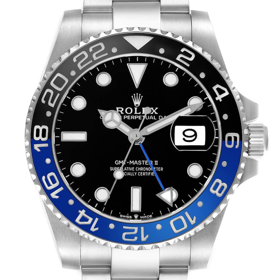 The Rolex GMT-Master watch is shown from the front, showcasing its bezel, dial, hands, and date window.