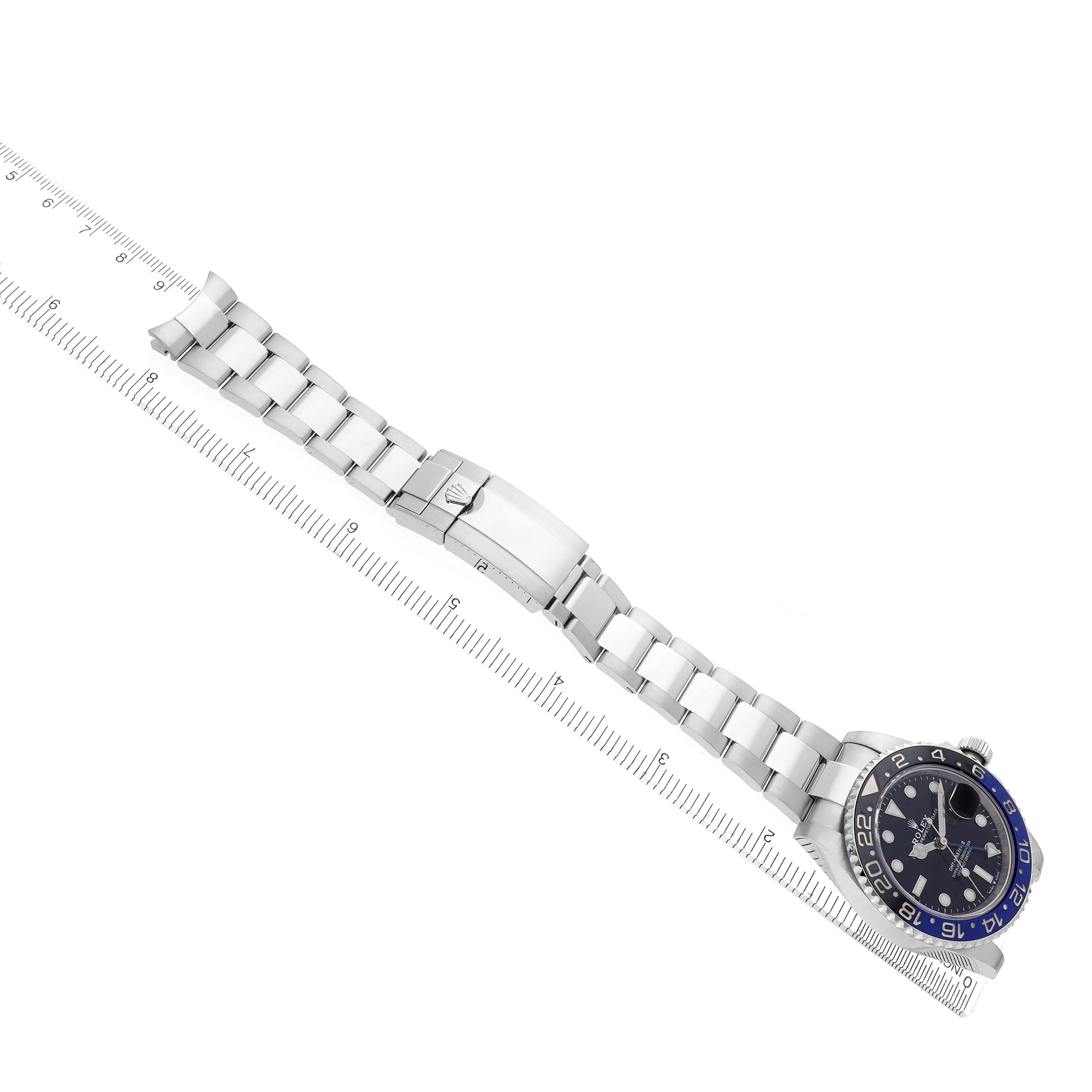 The Rolex GMT-Master 126710 Men
s Stainless Steel Black Dial 126710 Men
s Stainless Steel Black Dial watch is shown diagonally, displaying the bracelet, clasp, and partially the dial and bezel.