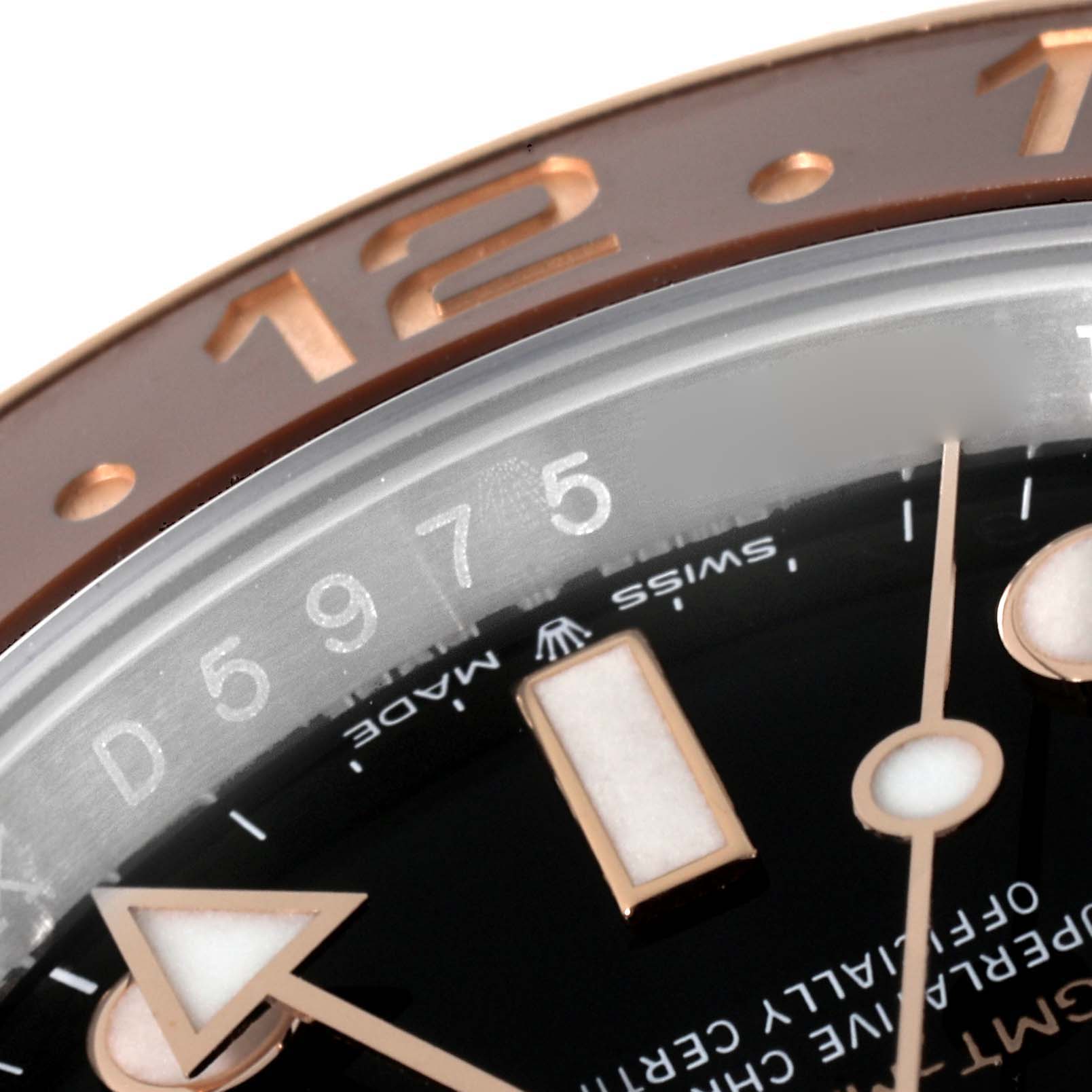 The image shows a close-up of the dial and bezel of a Rolex GMT-Master 126711CHNR Men's Steel and Gold (two tone) Black Dial 126711CHNR Men's Steel and Gold (two tone) Black Dial watch, highlighting the hour markers and a portion of the GMT hand.
