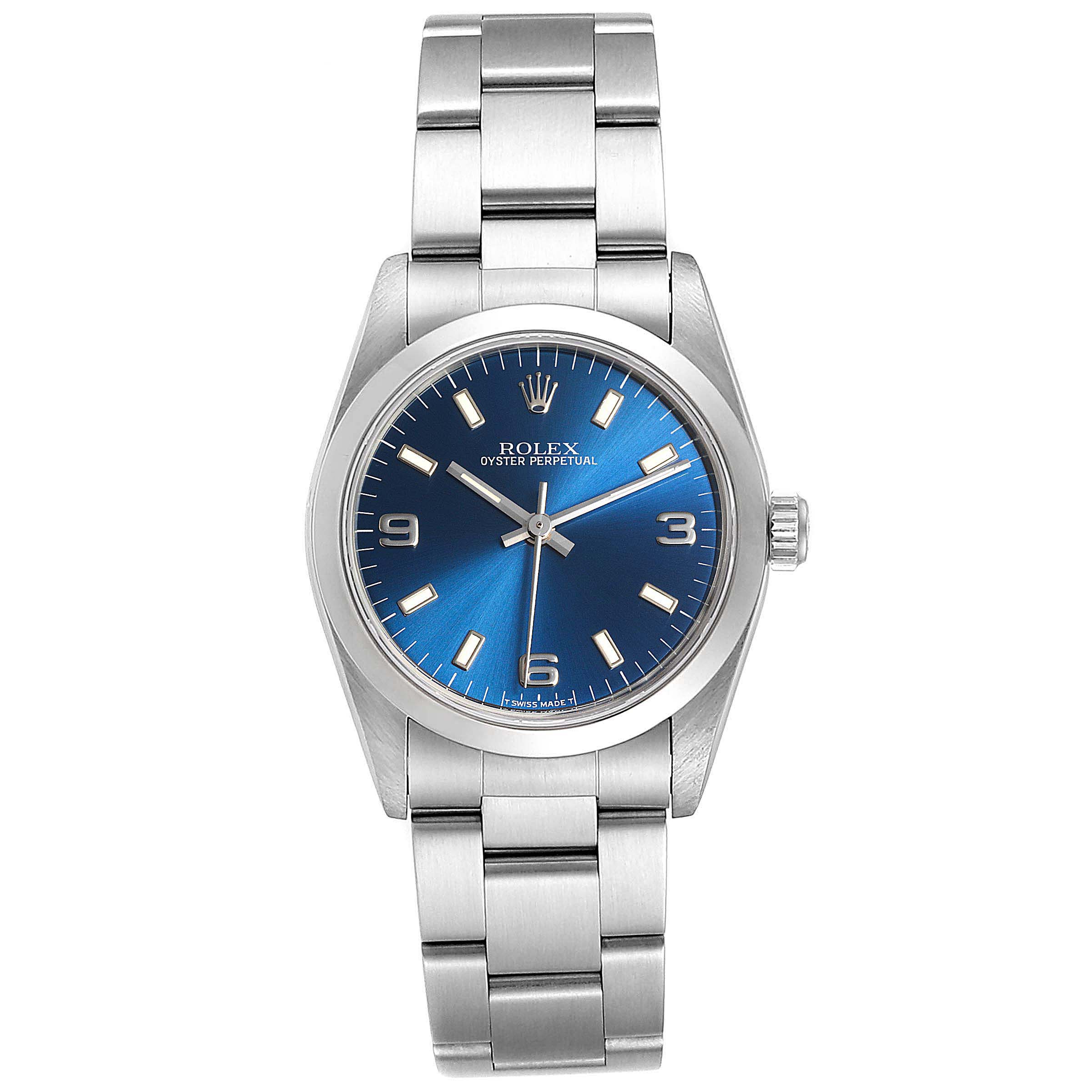 This image shows a frontal view of a Rolex Mid-Size 67480 Women
s Stainless Steel Blue Dial 67480 Women
s Stainless Steel Blue Dial Oyster Perpetual watch with a blue dial and a stainless steel bracelet.