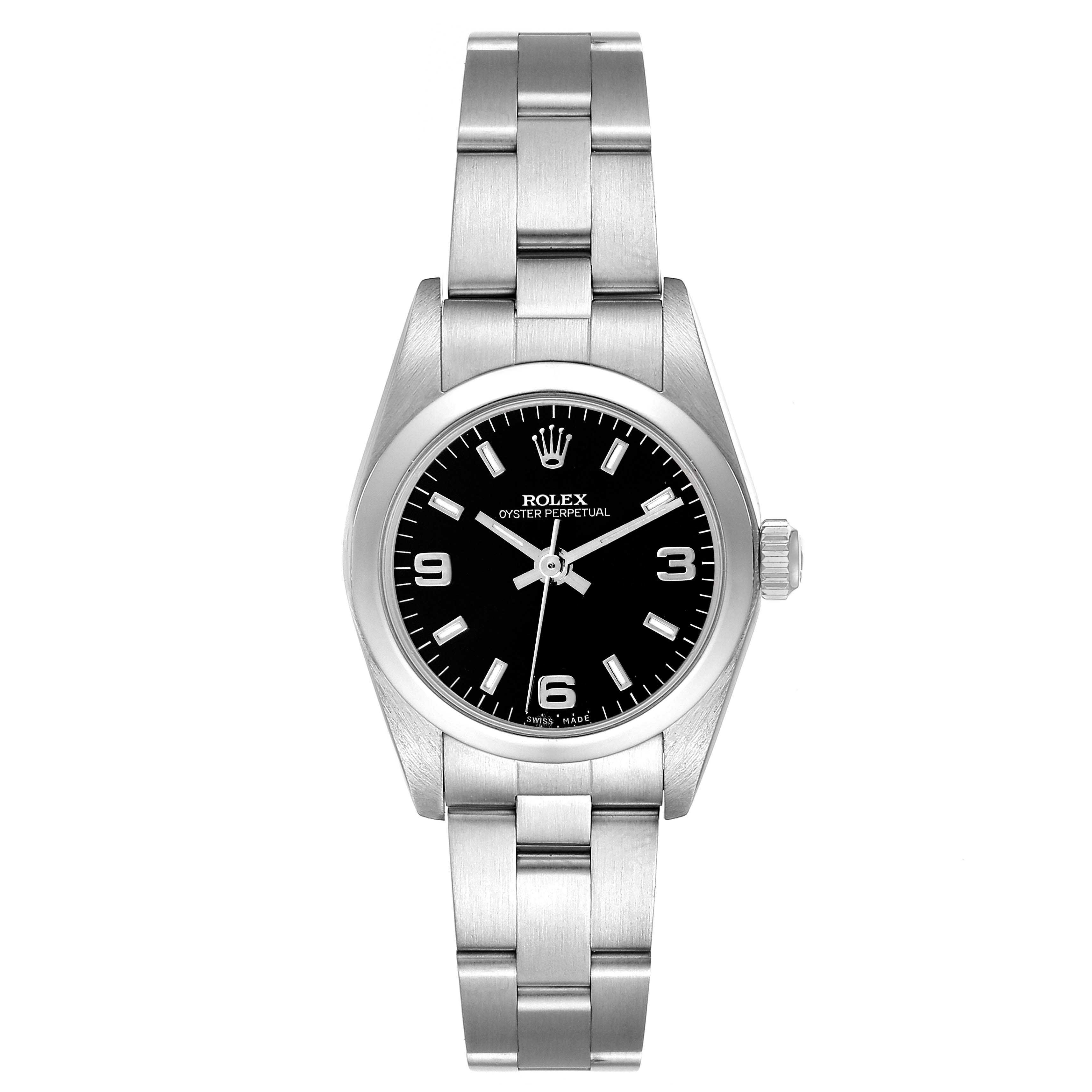 The Rolex Oyster Perpetual 76080 Women
s Stainless Steel Black Dial 76080 Women
s Stainless Steel Black Dial watch is shown from a top-down angle, displaying its dial, bezel, bracelet, and crown.
