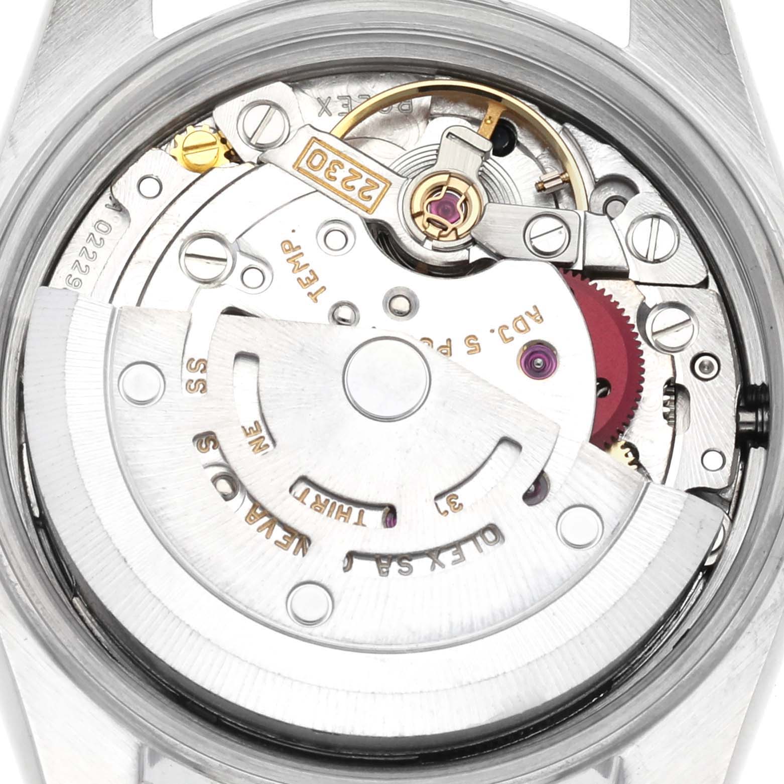 The image shows the Rolex Oyster Perpetual 76080 Women
s Stainless Steel Black Dial 76080 Women
s Stainless Steel Black Dial
s movement, highlighting its intricate mechanism and rotor from a top-down angle.