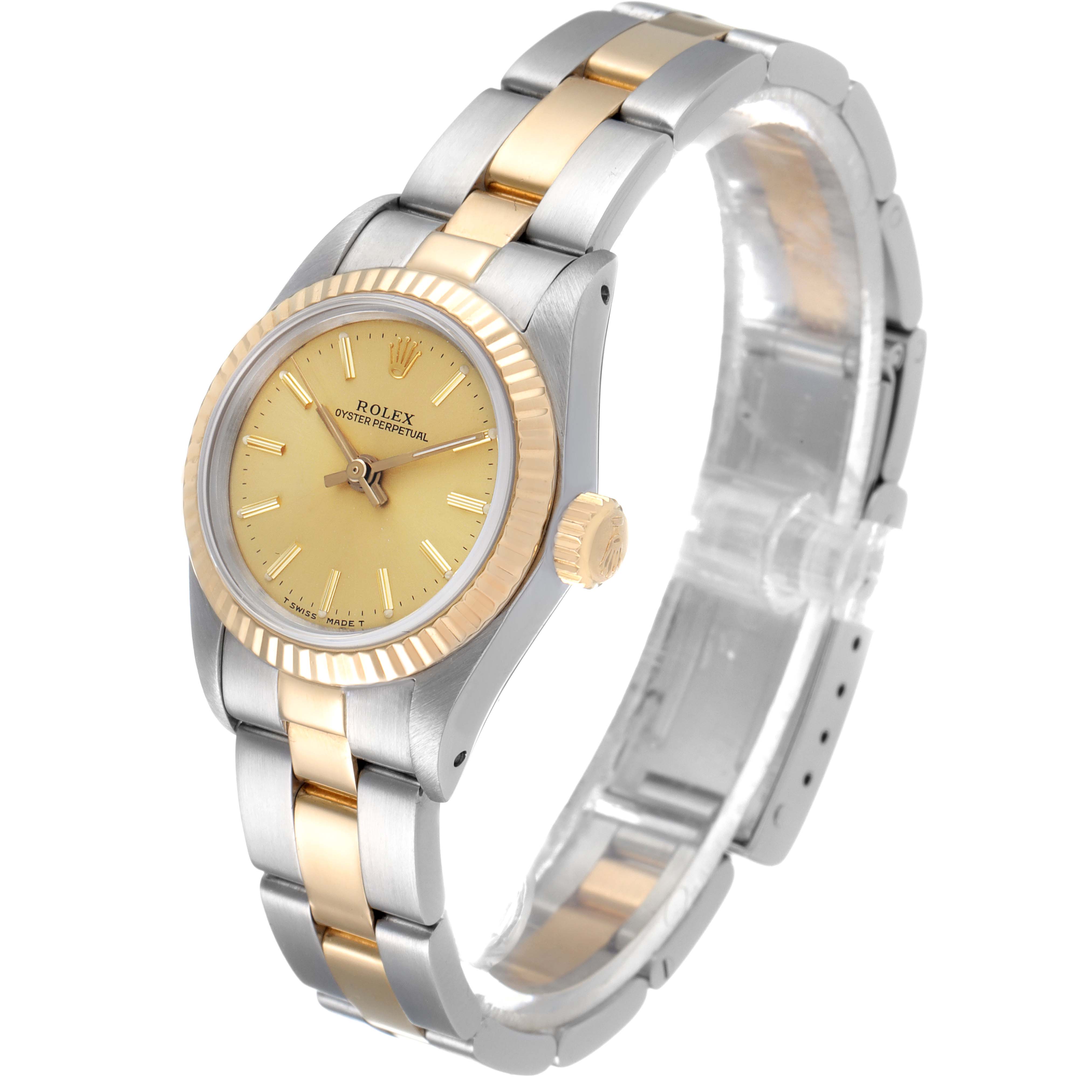 The Rolex Oyster Perpetual 67193 Women
s Steel and Gold (two tone) Champagne Dial 67193 Women
s Steel and Gold (two tone) Champagne Dial watch is shown at a 3/4 angle, highlighting the dial, bezel, crown, and bracelet.