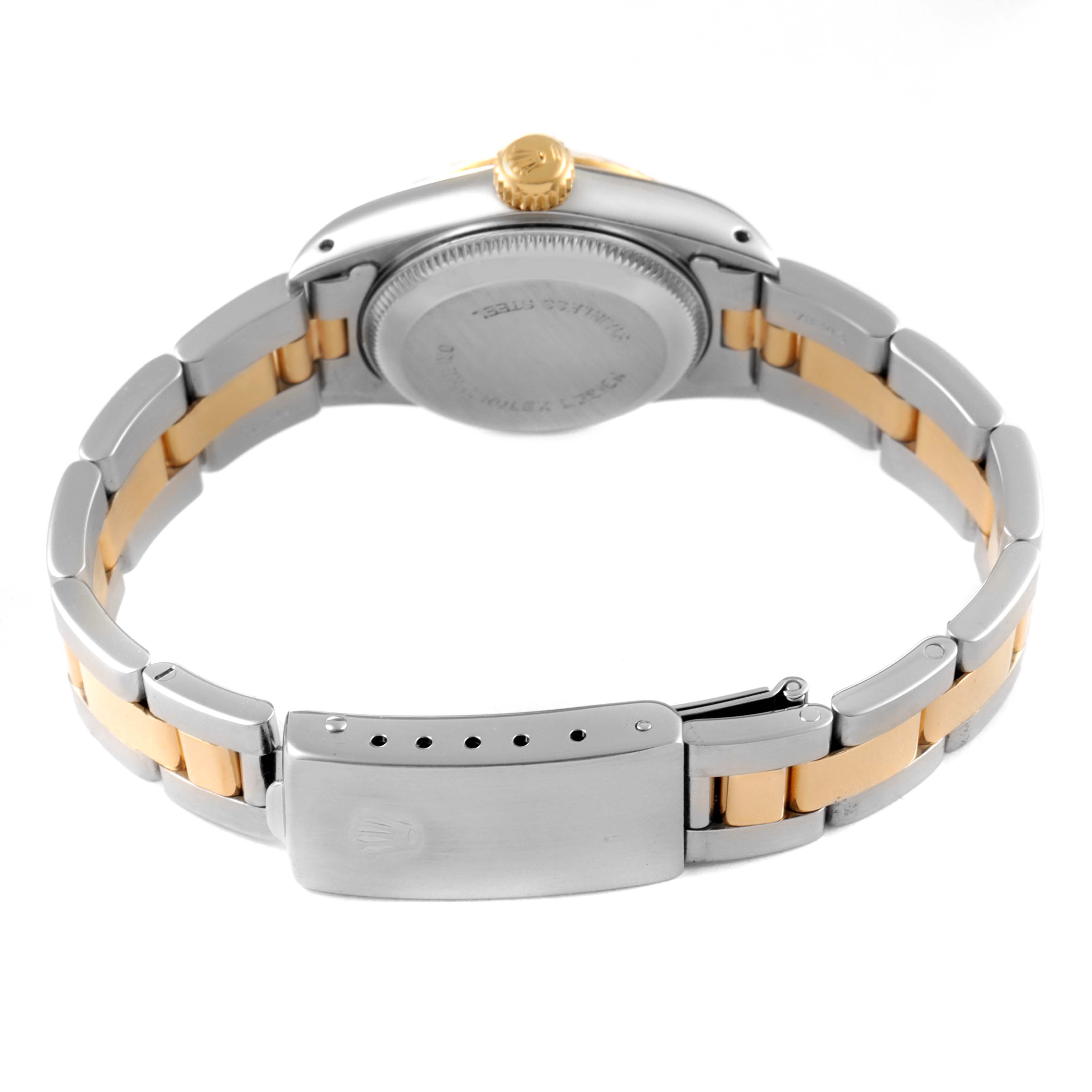 This image shows the back view of a Rolex Oyster Perpetual 67193 Women
s Steel and Gold (two tone) Champagne Dial 67193 Women
s Steel and Gold (two tone) Champagne Dial watch, highlighting the clasp, bracelet, and case back.